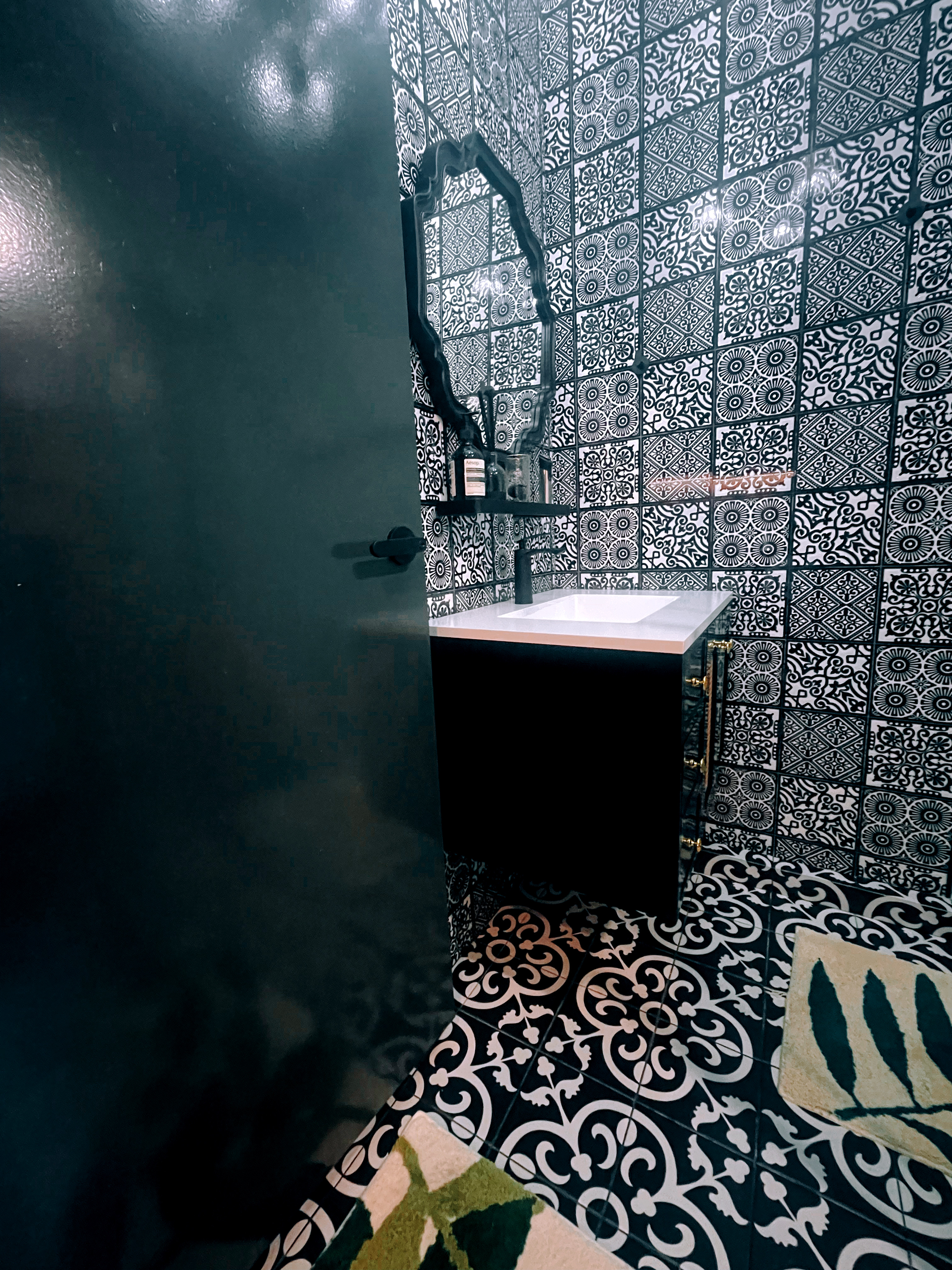 A Touch of Tradition: Our Bathrooms with Peranakan Tile Charm - Black and white ornate tiles, black and white patterned wall