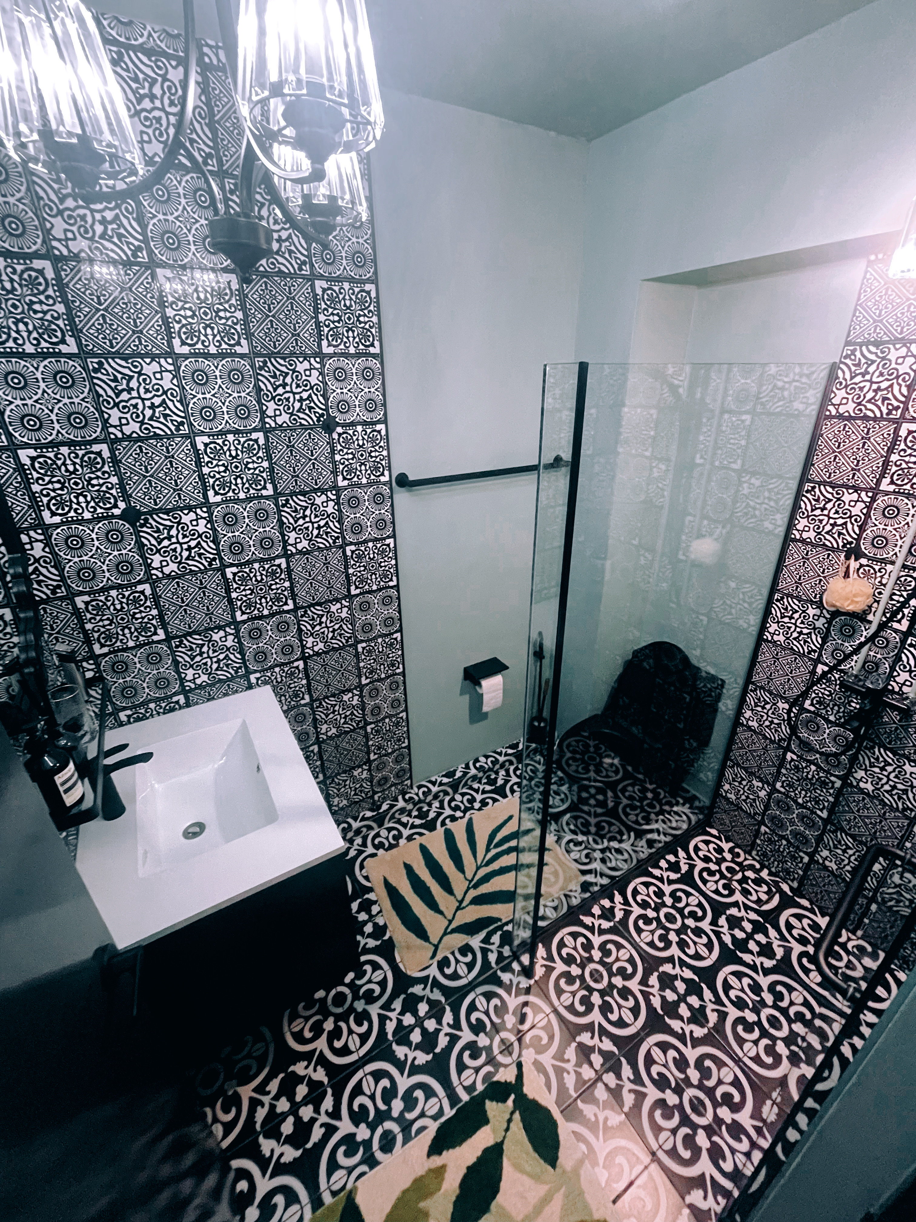 A Touch of Tradition: Our Bathrooms with Peranakan Tile Charm - Black and white patterned tiles, glass shower enclosure
