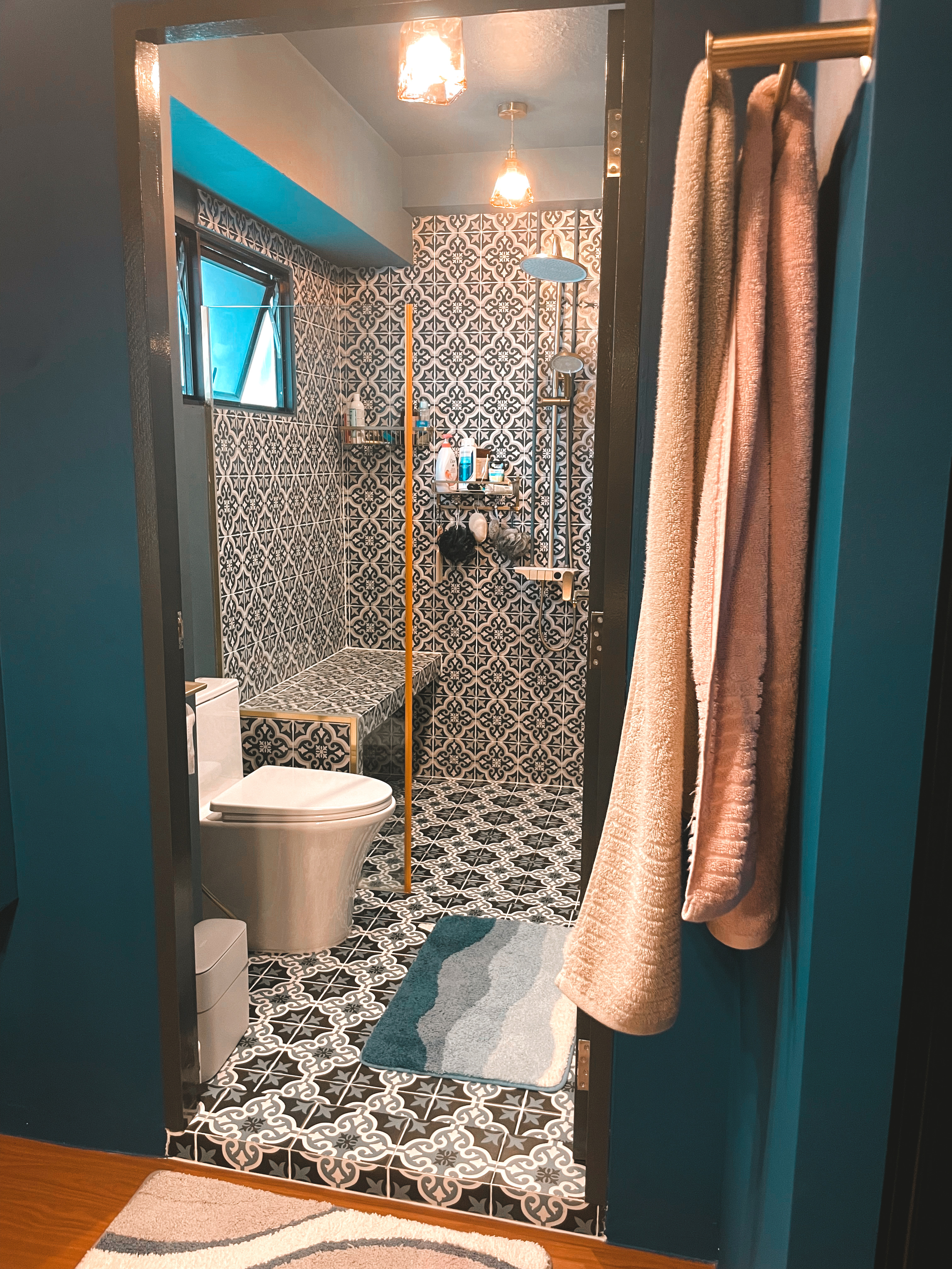 A Touch of Tradition: Our Bathrooms with Peranakan Tile Charm - Patterned tiles, teal walls, modern fixtures, beige towels