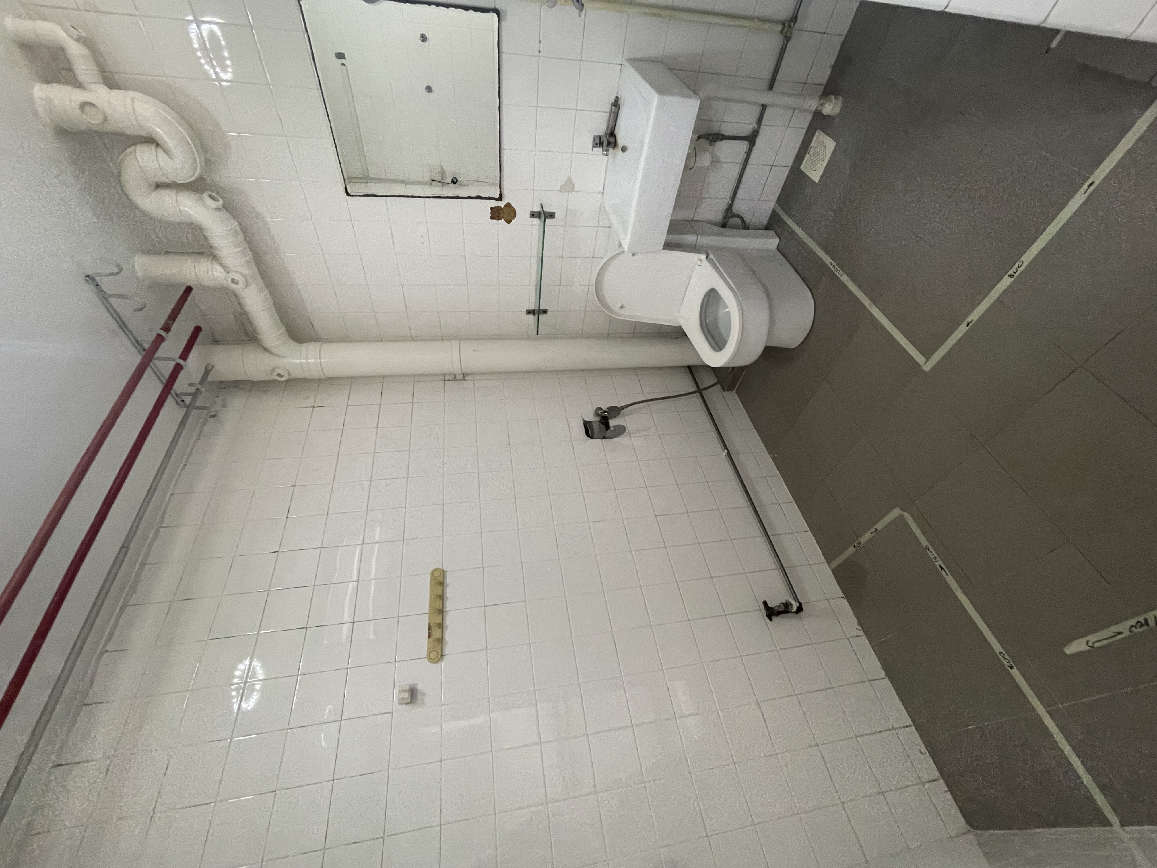 A Touch of Tradition: Our Bathrooms with Peranakan Tile Charm - White tiled walls, white tiled floor, white toilet, white