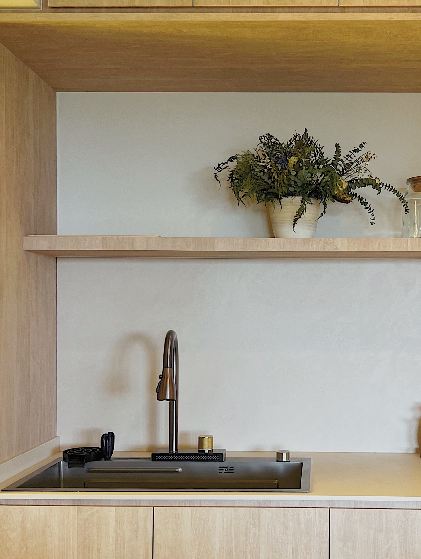 Here are our Plant Babies! 👶🏻🌱 - Wooden kitchen cabinetry, minimalist design, modern kitchen, sleek sink, black faucet