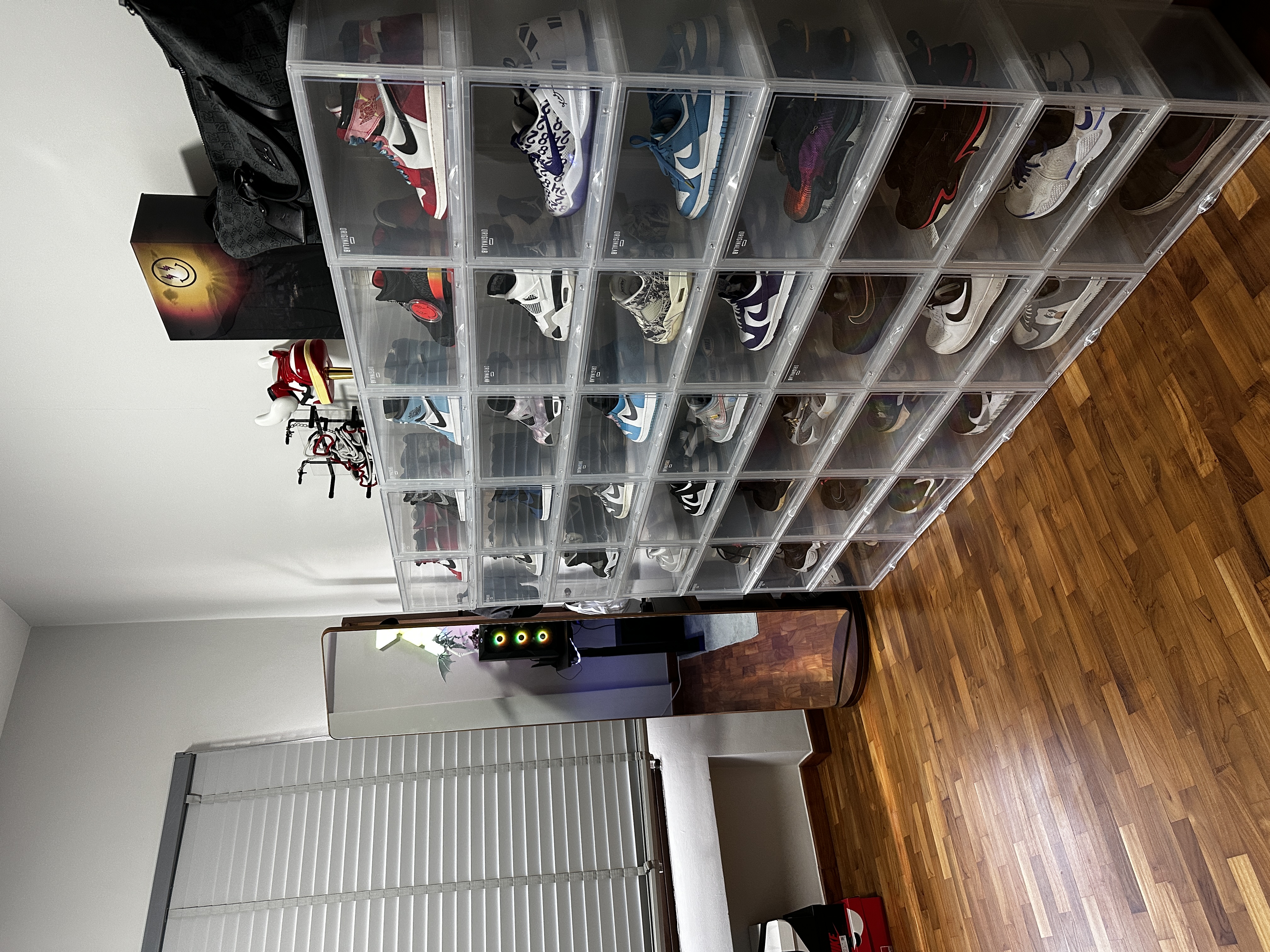 Our study room with a shoe collection and zero built-ins!  - Clear plastic shoe storage bins, neatly organized sneakers