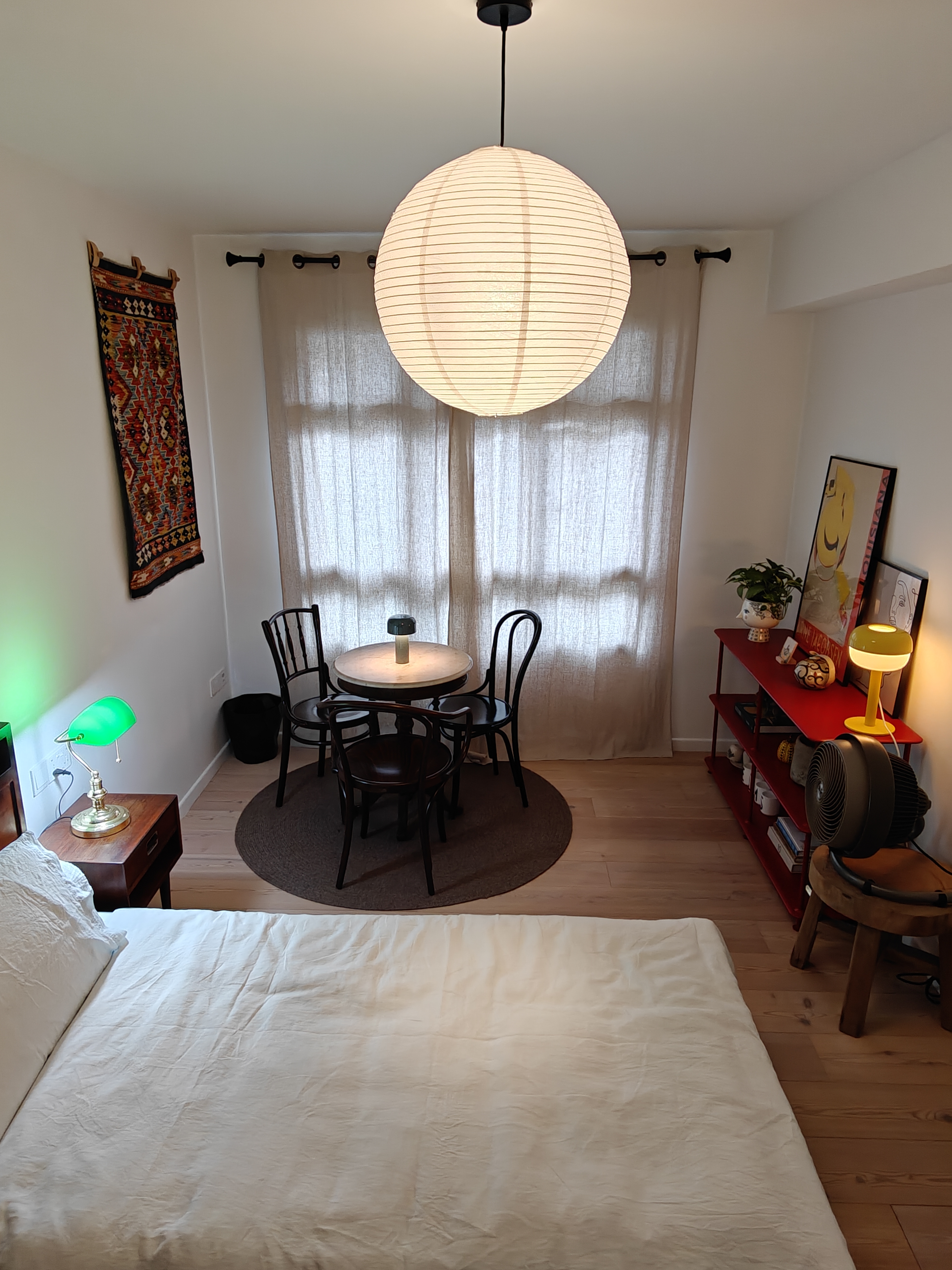 Change Is A Constant! - Large, round, white paper lantern hanging from ceiling, cozy bedroom, modern decor, wooden nightstand