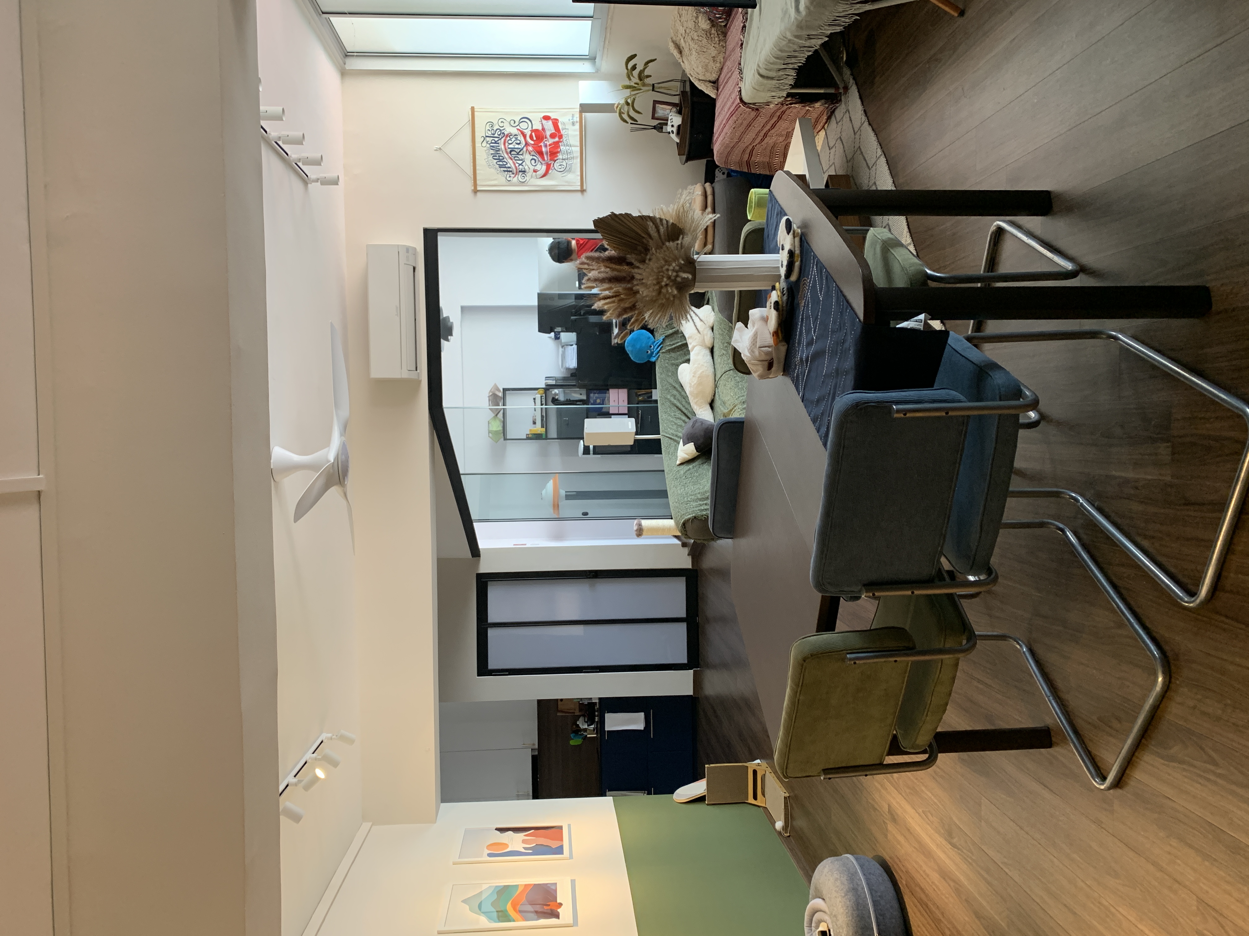 Render vs Reality: Our Living Room Reno Journey - Modern living room, minimalist decor, cozy seating area, green sofa, plush