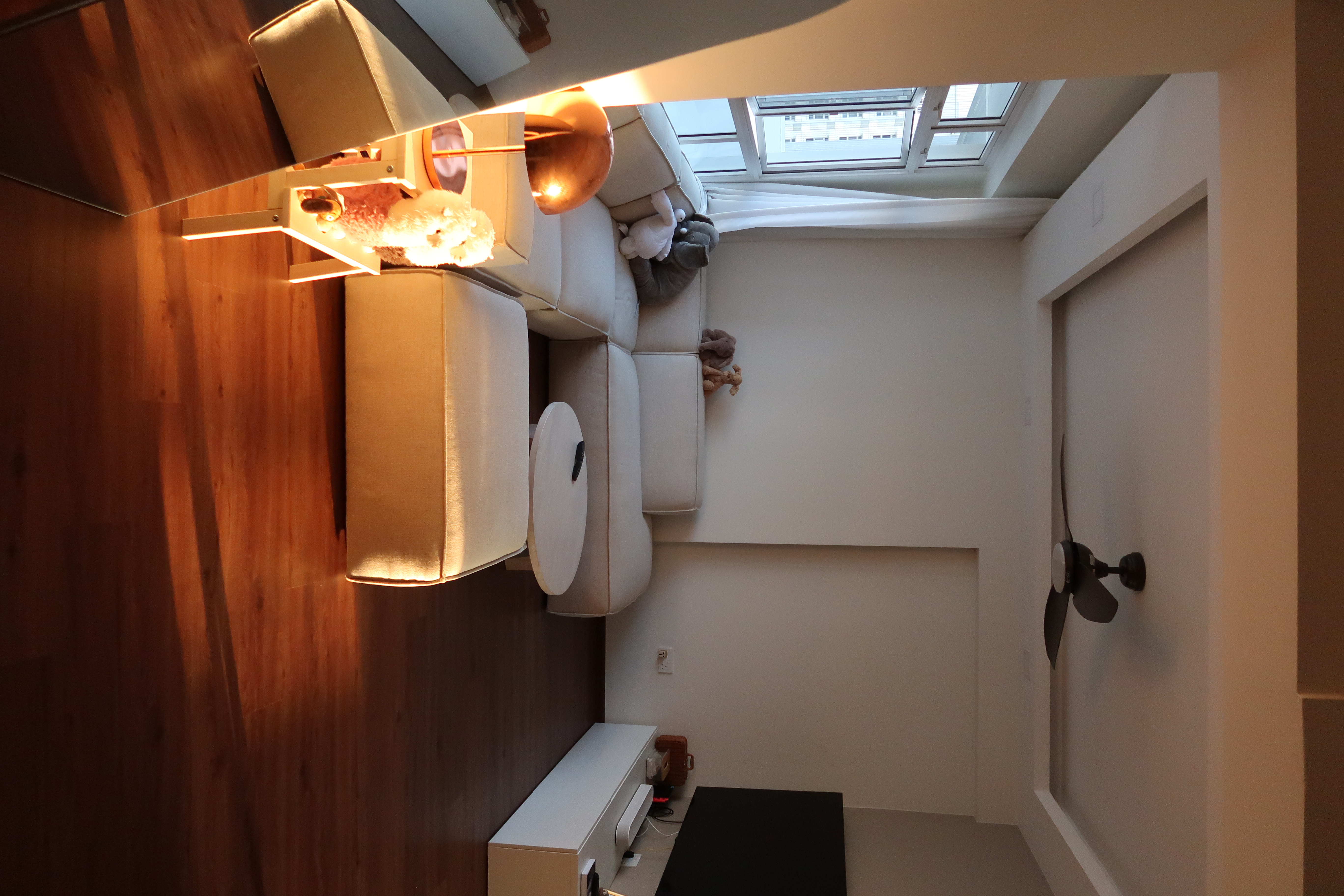 Burning questions we get asked often (Resale HDB) - Wooden floor, modern interior, cozy room, beige couch, white curtains