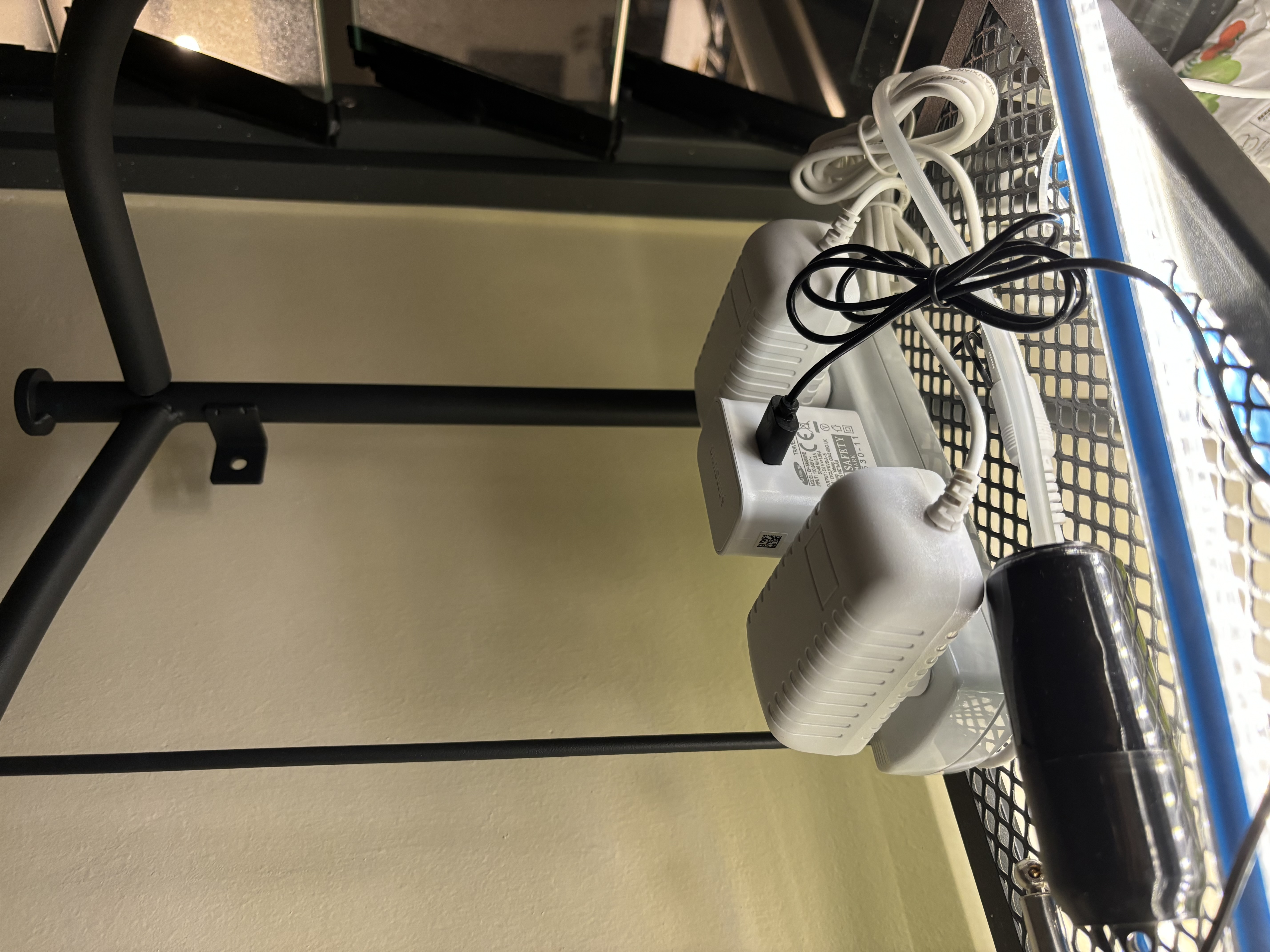 Our green corner: A space-saving, DIY, plant rack!  - wire, cables, power cord, electrical plug, wall socket, black cable