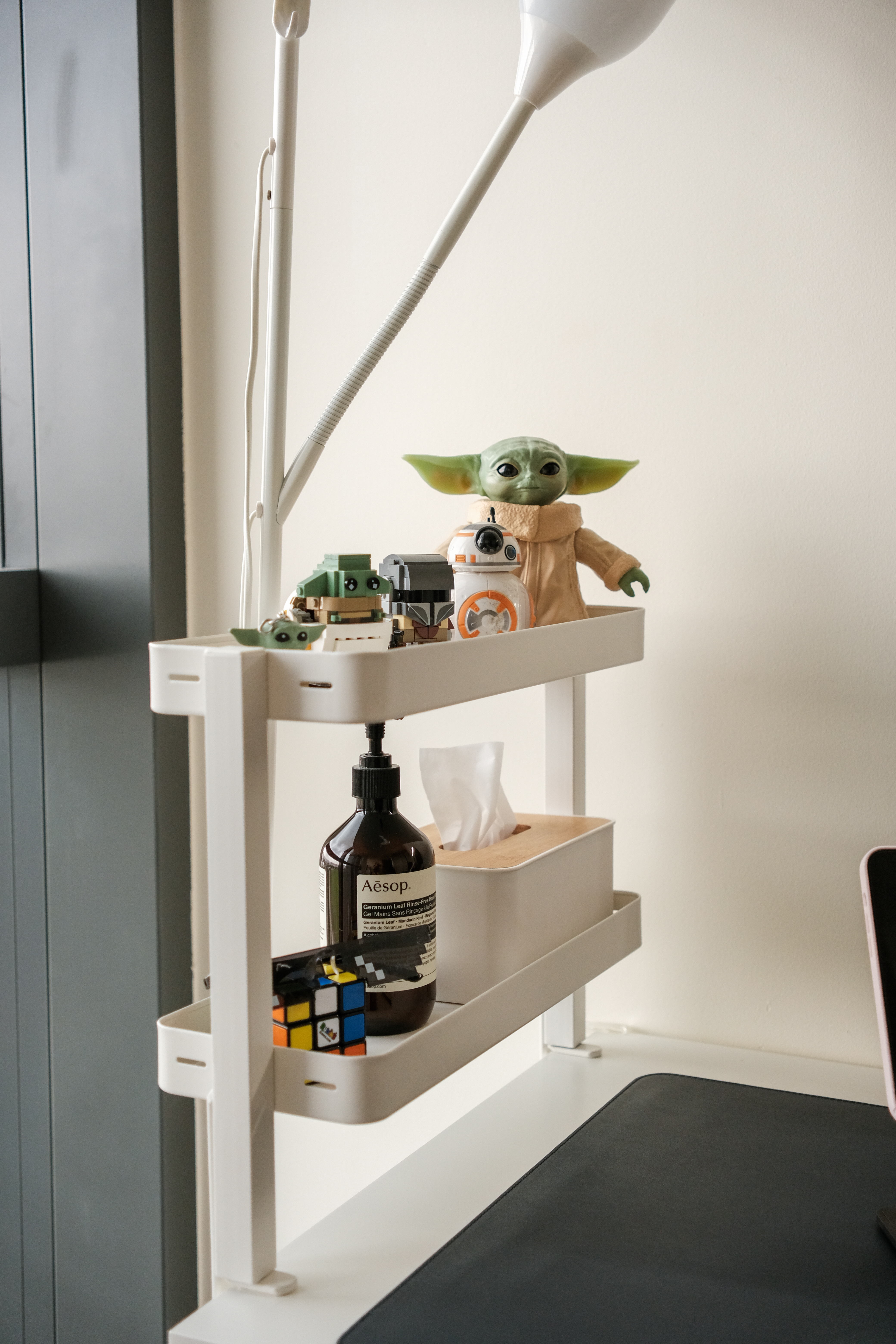 Our versatile guest room/study room! ✨ - Miniature figures of Yoda and R2-D2 on a white shelf, bottle of Aesop's Bear