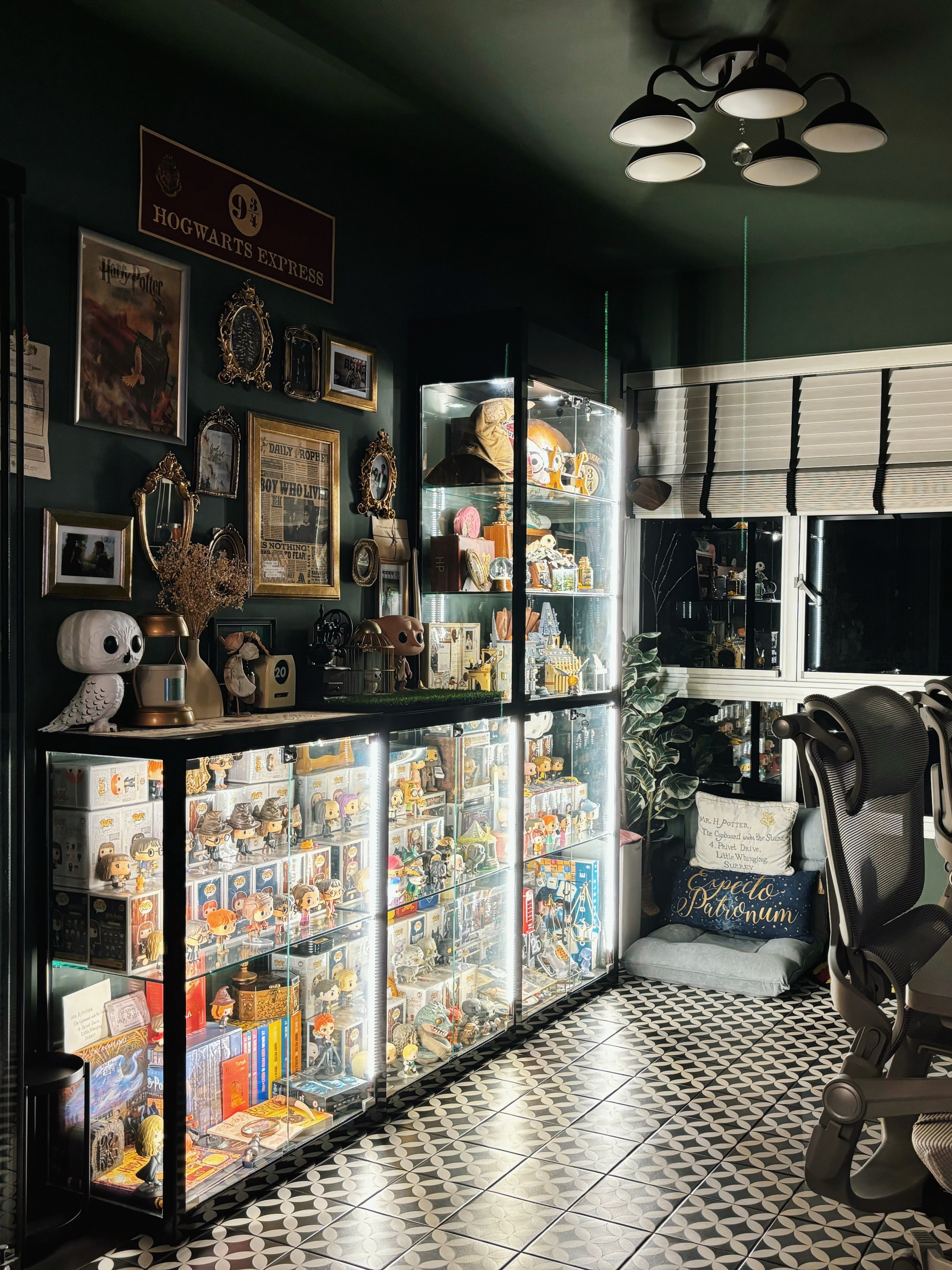 Muggle Tasks, Magical Vibes: Our Home Workspace - display case filled with Harry Potter figurines, framed pictures of Harry
