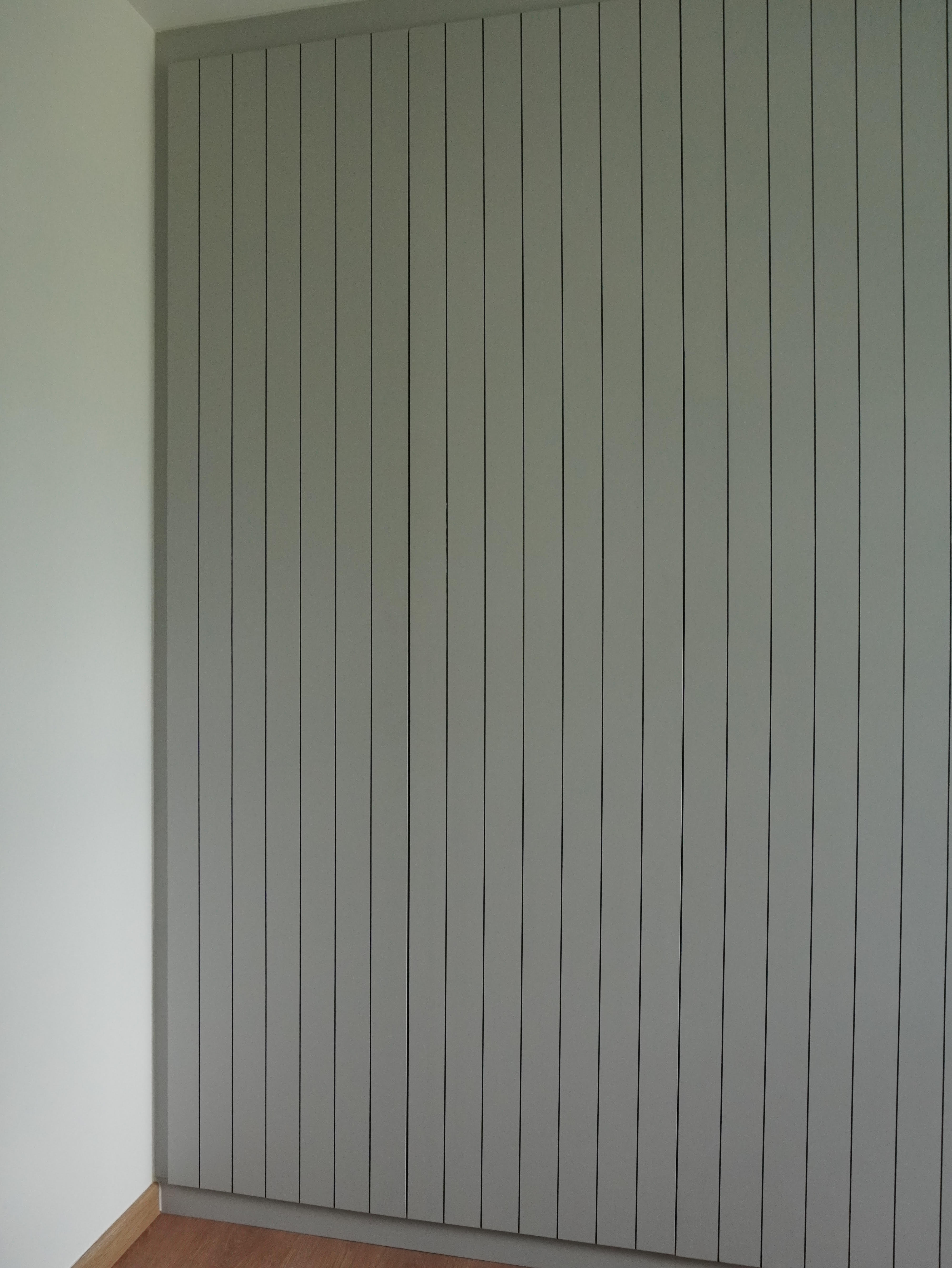 Simple solutions to hide the mess!  - Grey vertical panel wall, minimalist interior design, modern aesthetic, clean lines
