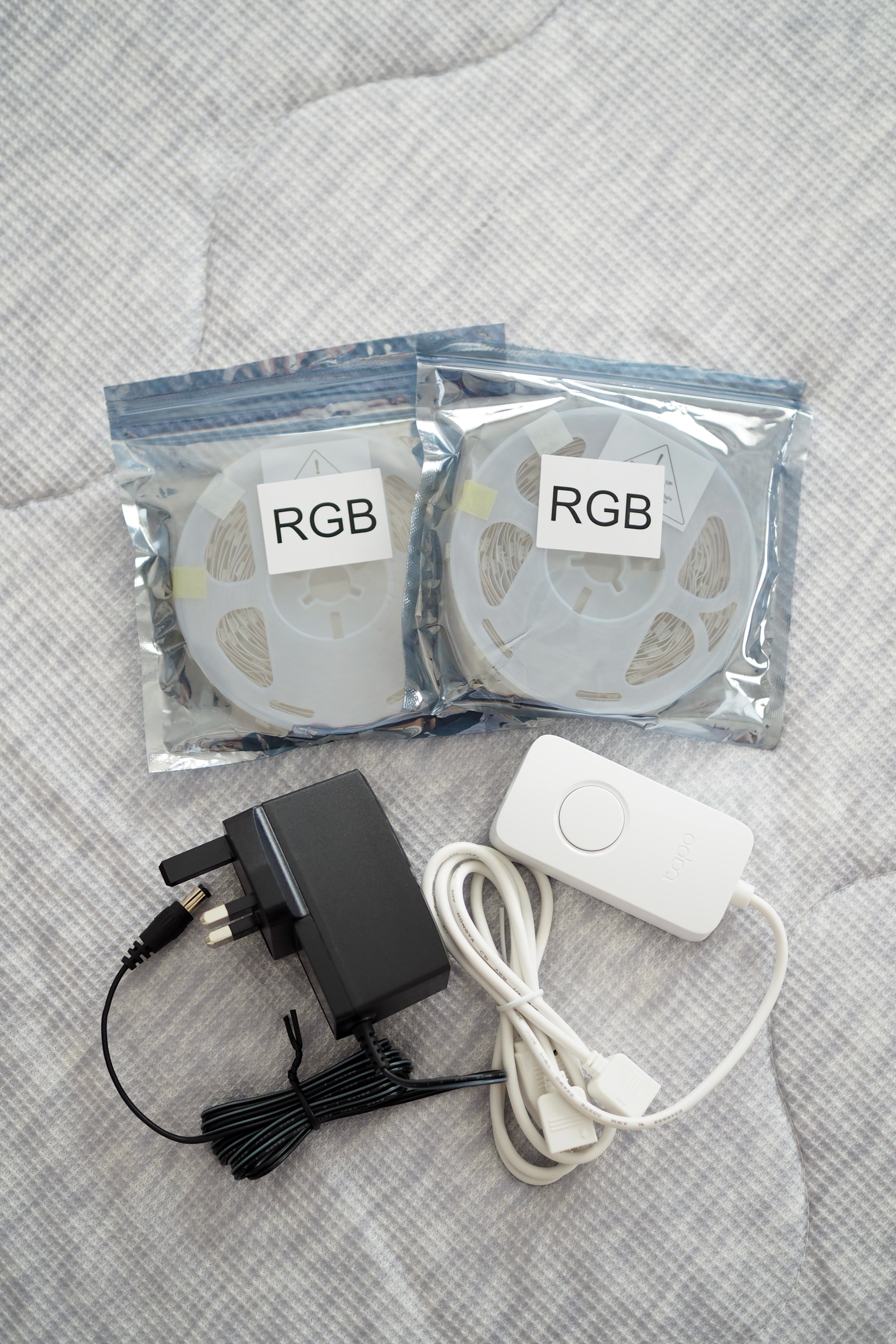 Transform your bedroom with this DIY ‘Floating Bed’ light trick! - RGB packaging, white disc, flexible ribbon, power adapter