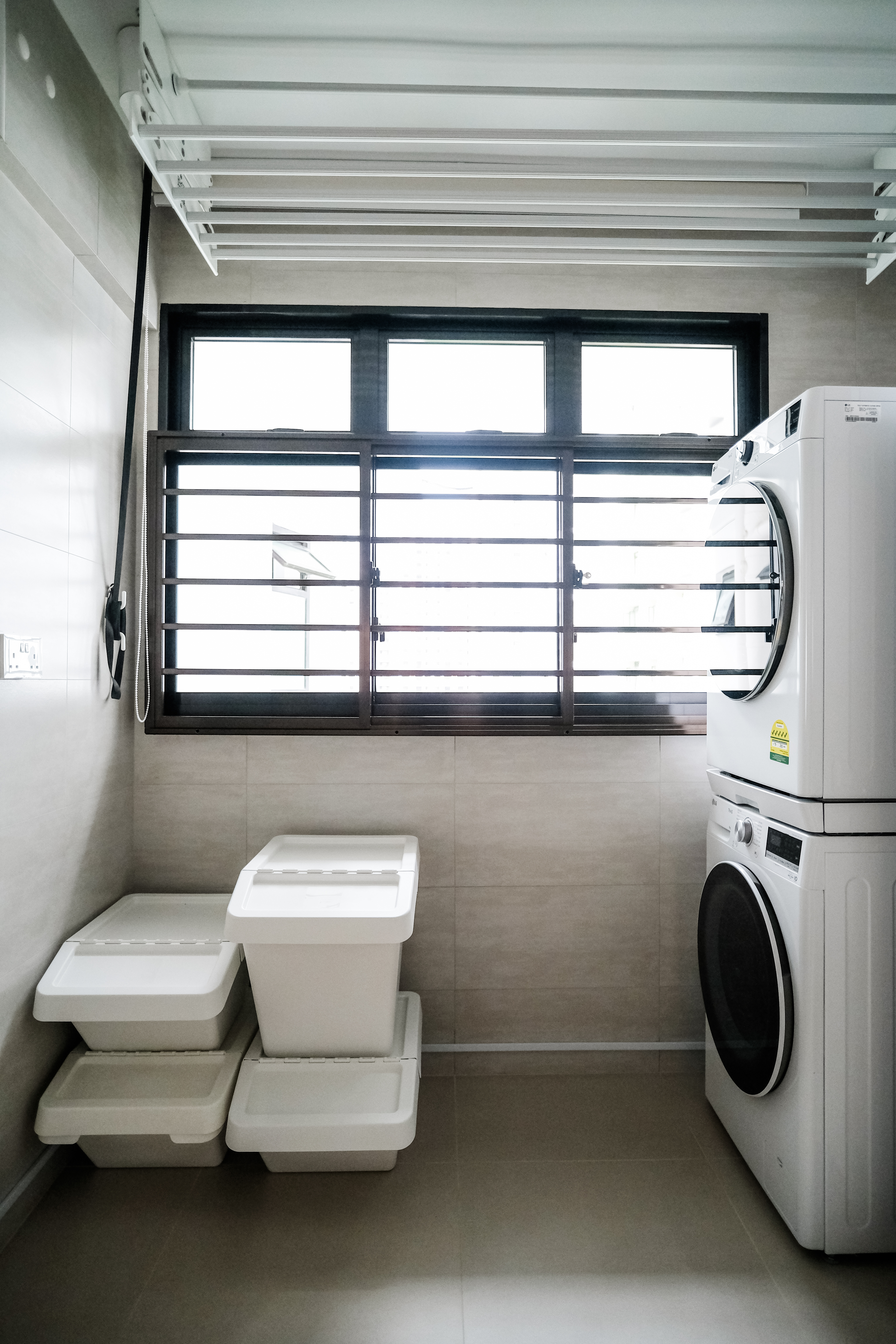 Maximizing Functionality: The Ultimate Compact Service Yard - Small bathroom with built-in sink and toilet, white washing