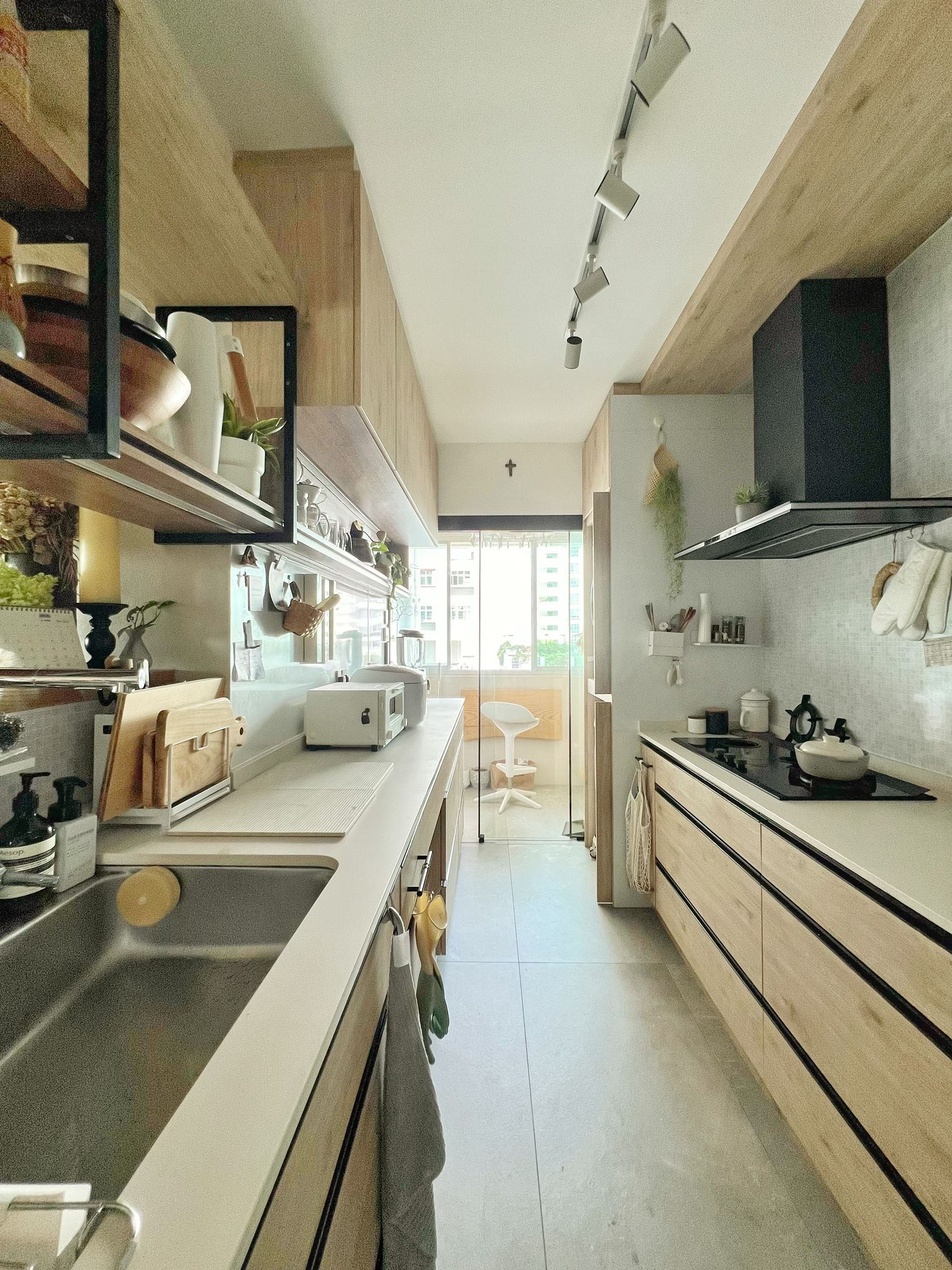 Weekend Realities: Housework and Tuition Edition - Wooden cabinetry, modern kitchen, minimalist design, sleek appliances