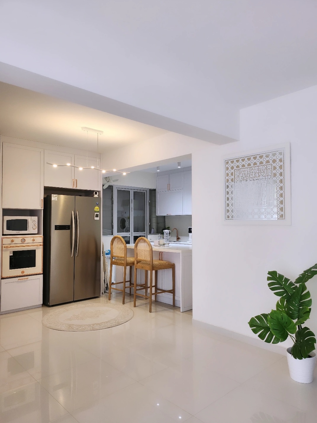 Renders Vs Reality by punggoHField - Modern kitchen with sleek stainless steel refrigerator, white cabinets, and integrated