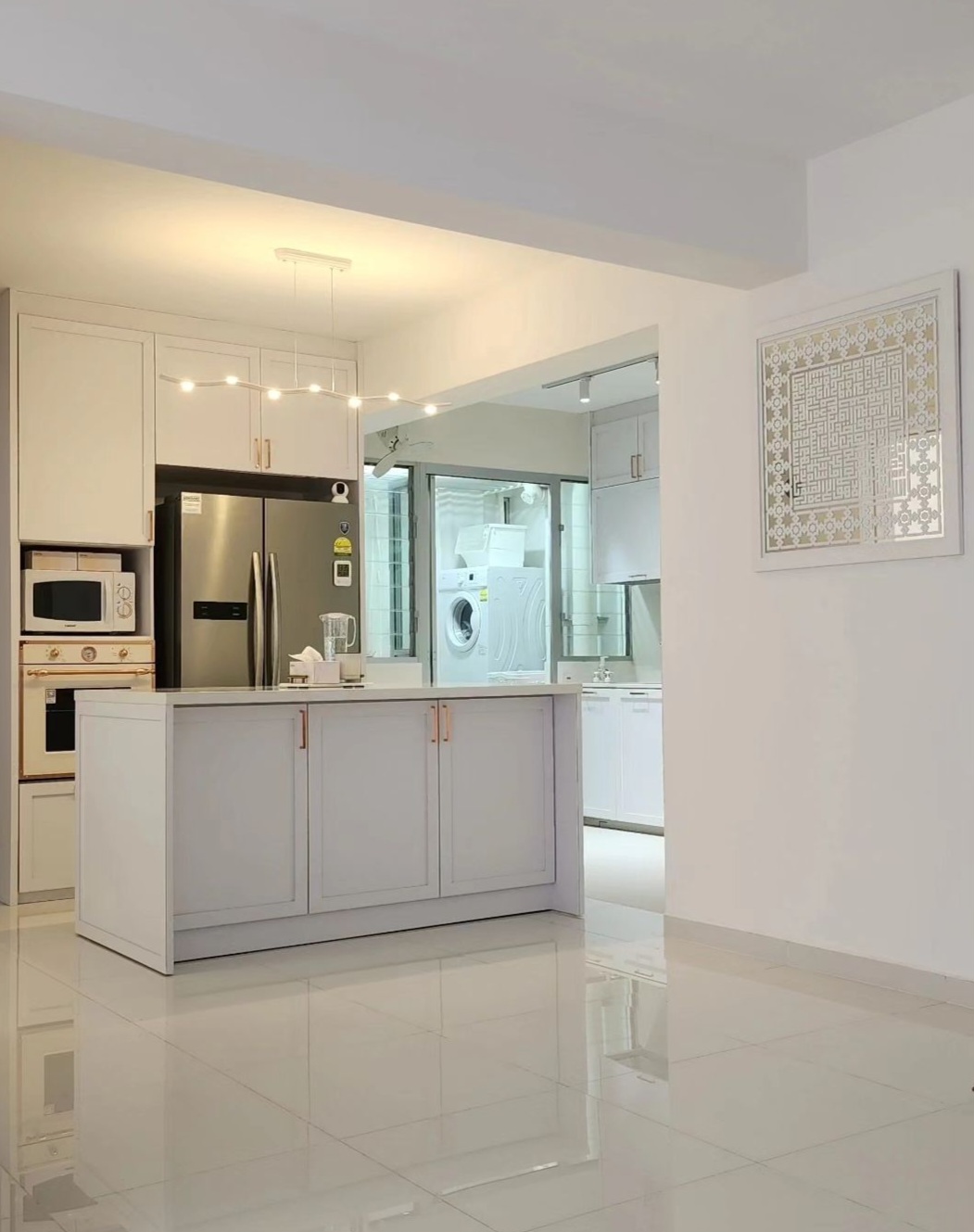 Renders Vs Reality by punggoHField - Modern kitchen with sleek white cabinetry, stainless steel appliances, and a
