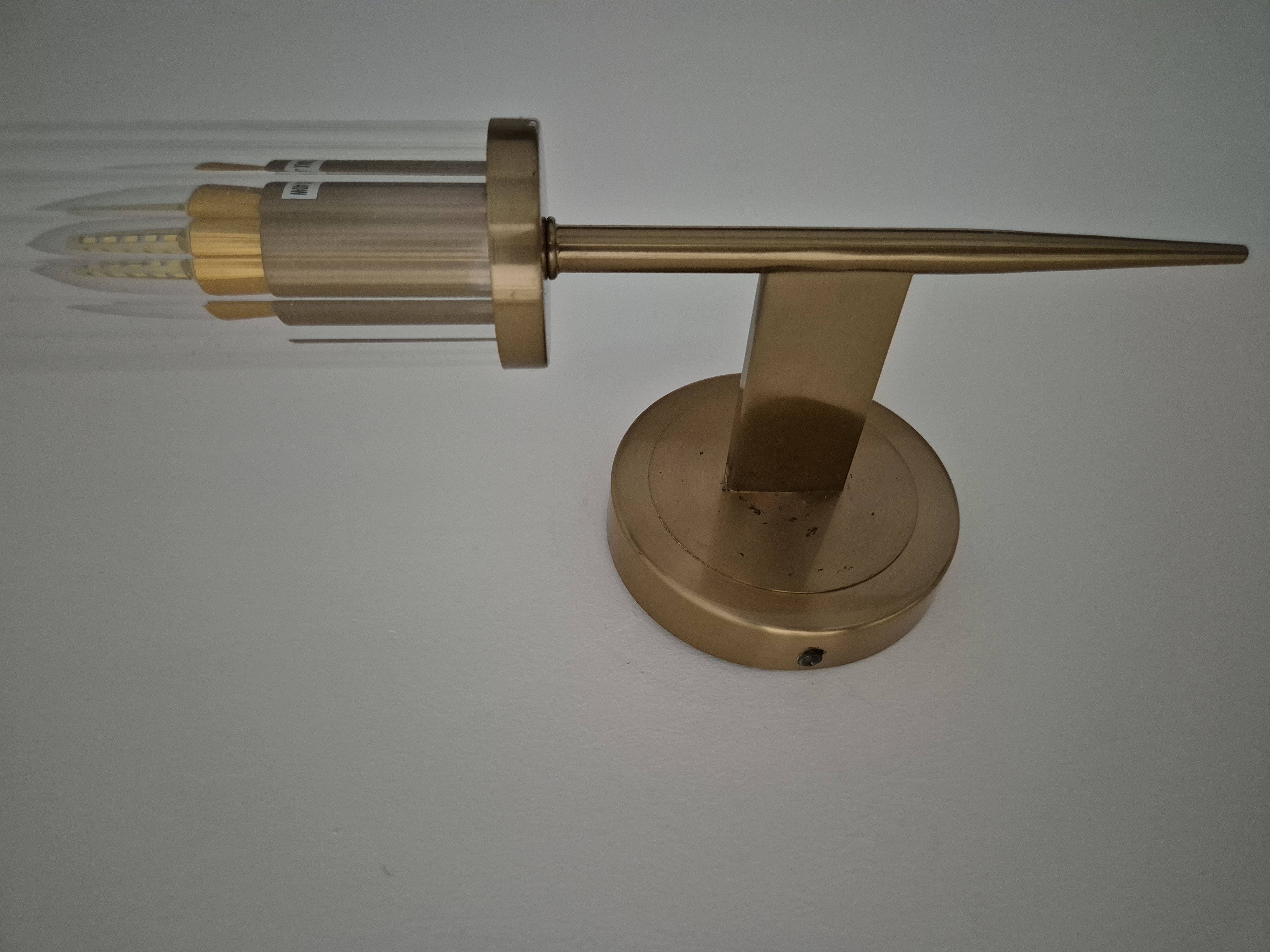 Aesthetics by punggoHField - Golden lamp with intricate design, sleek metallic finish, modern aesthetic, elegant and