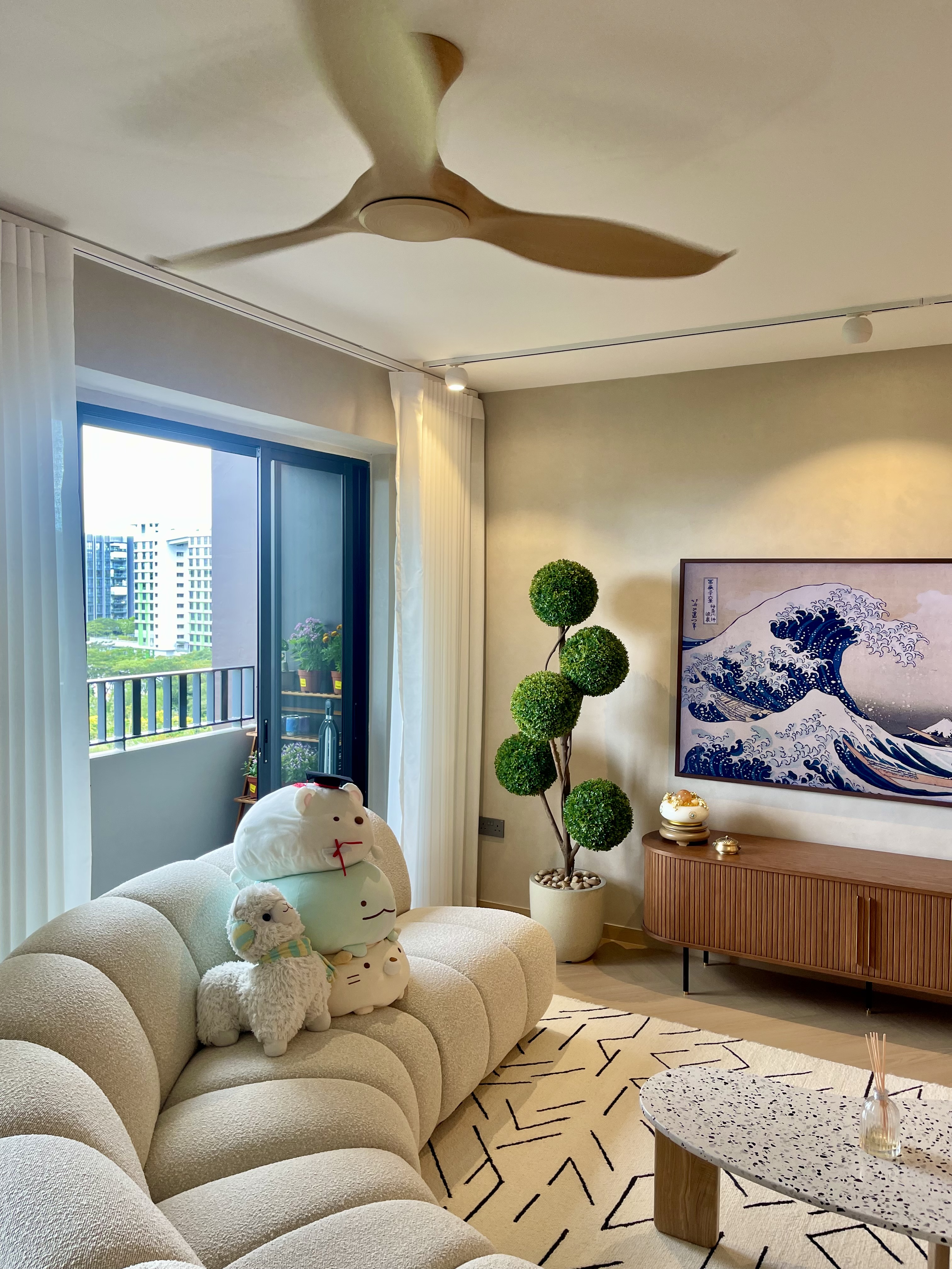 Our Green Oasis: Bringing Life Into Our Cosy Crib 🌿🍃 - Modern living room with plush beige sofa, decorative stuffed