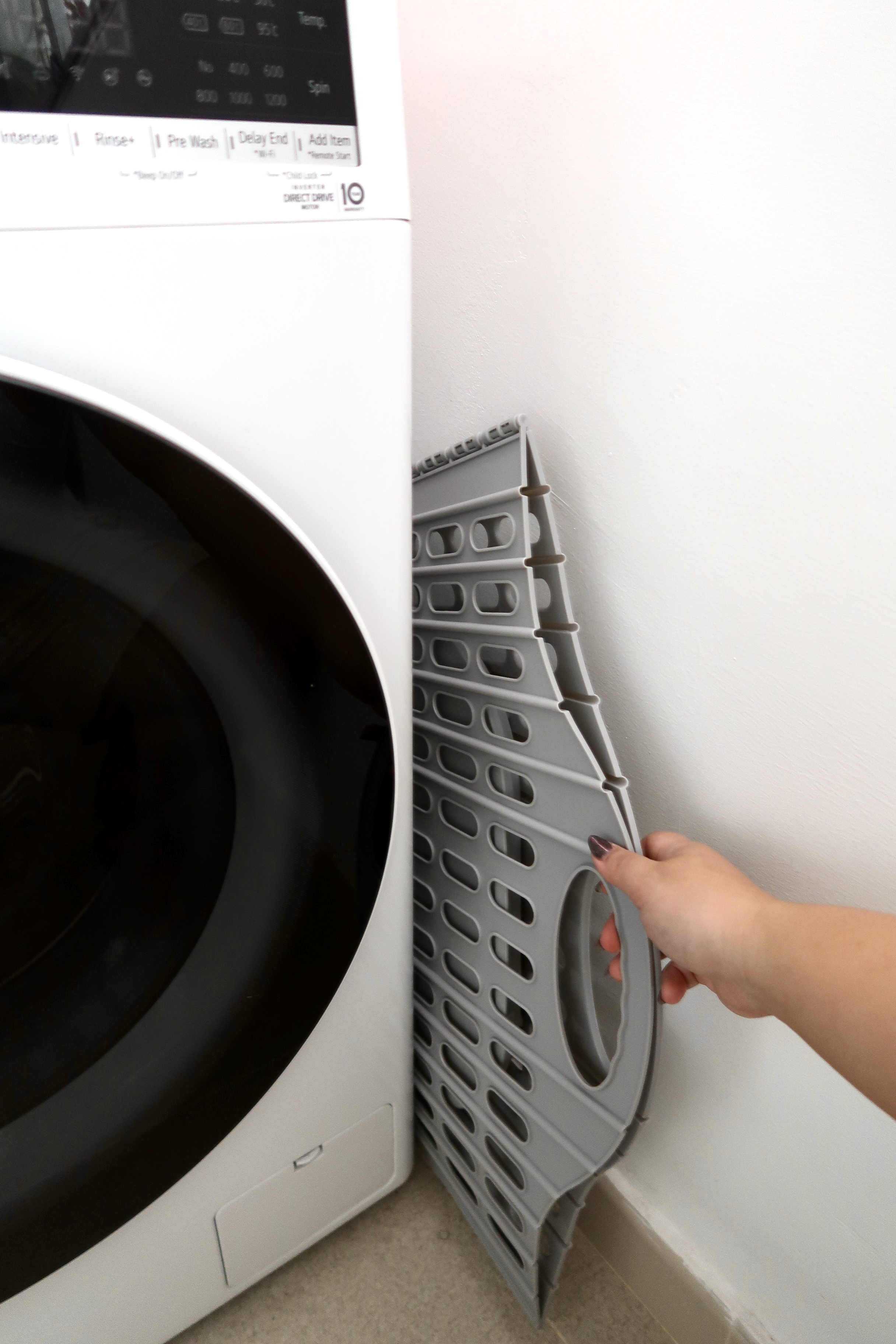 Multi-Use Service Yard with a Fermentation Nook  - Step-by-step guide to removing the drying rack from a washing machine