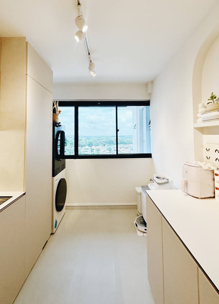Our Service Yard: Laundry cabinet goals!  - Modern kitchen with sleek white cabinetry, large window offering a scenic view