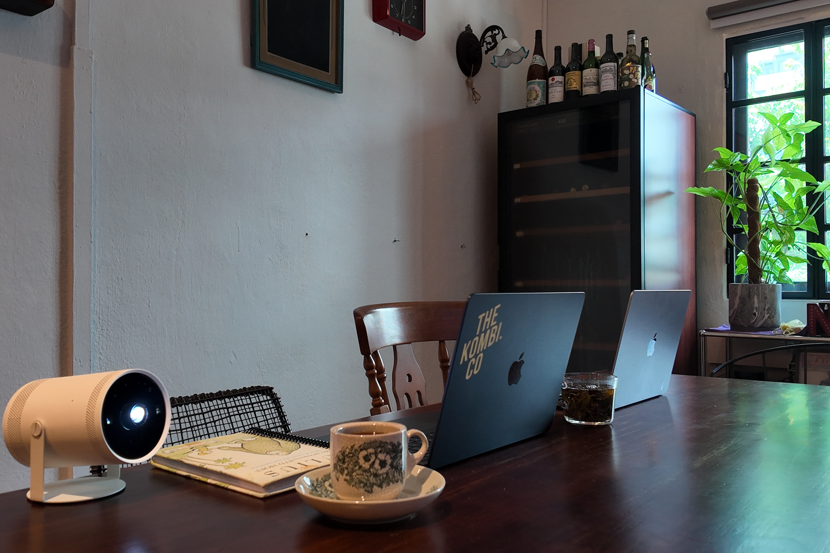 Work, Werk, Werk, Werk, Werk - smart home integration, modern workspace, dual laptop setup, coffee cup and saucer, smart