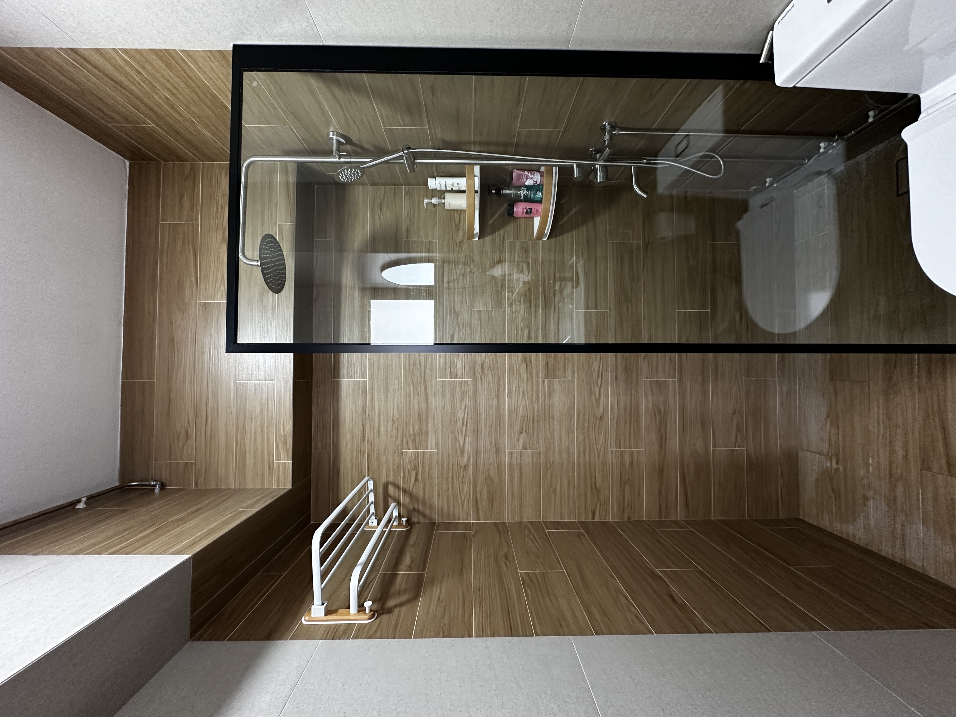 Our Bathroom: How we remodeled our bathroom with no carpentry!  - Wooden floor tiles, modern bathroom, sleek design, glass