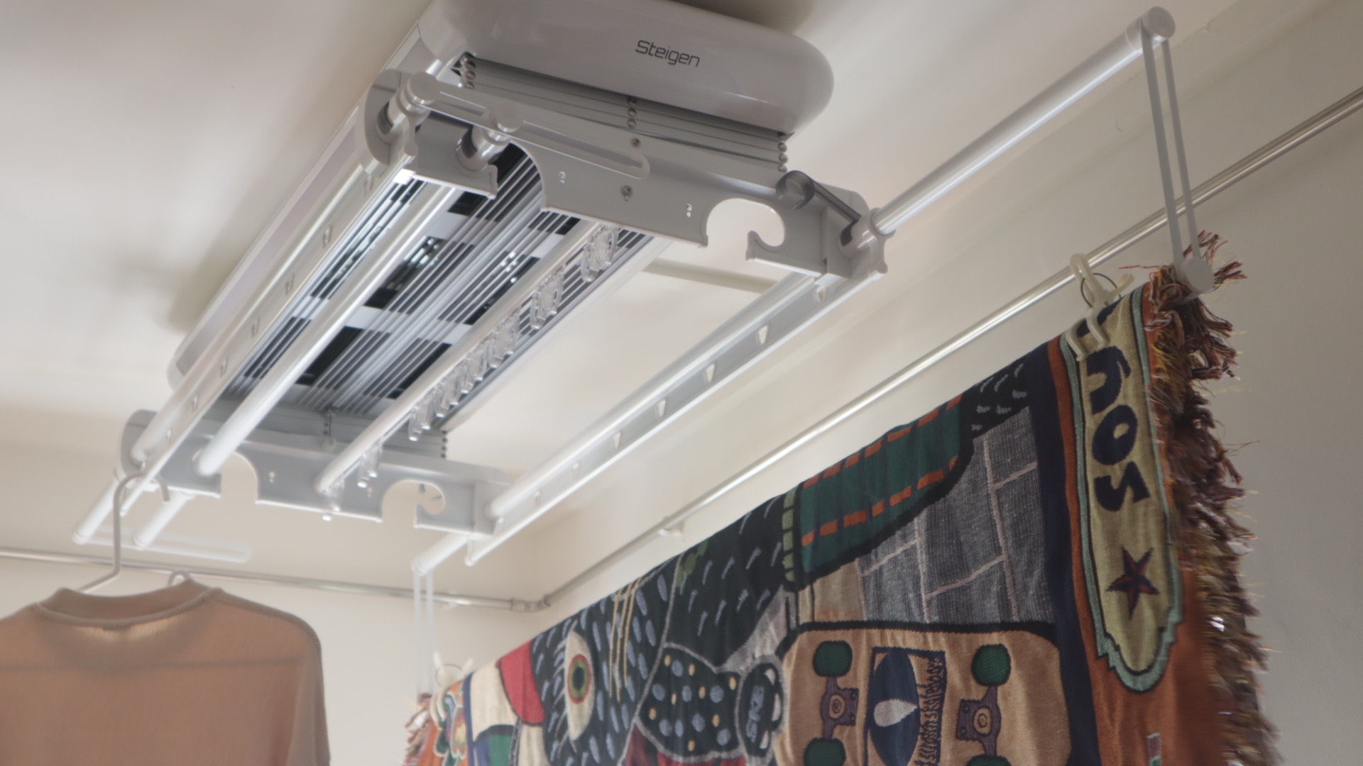 shared space within the kitchen for laundry works-simple and nifty! - Air conditioner unit mounted on ceiling, white frame