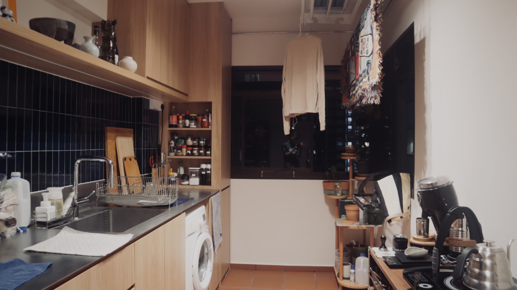 shared space within the kitchen for laundry works-simple and nifty! - Wooden kitchen cabinets, stainless steel sink, dish