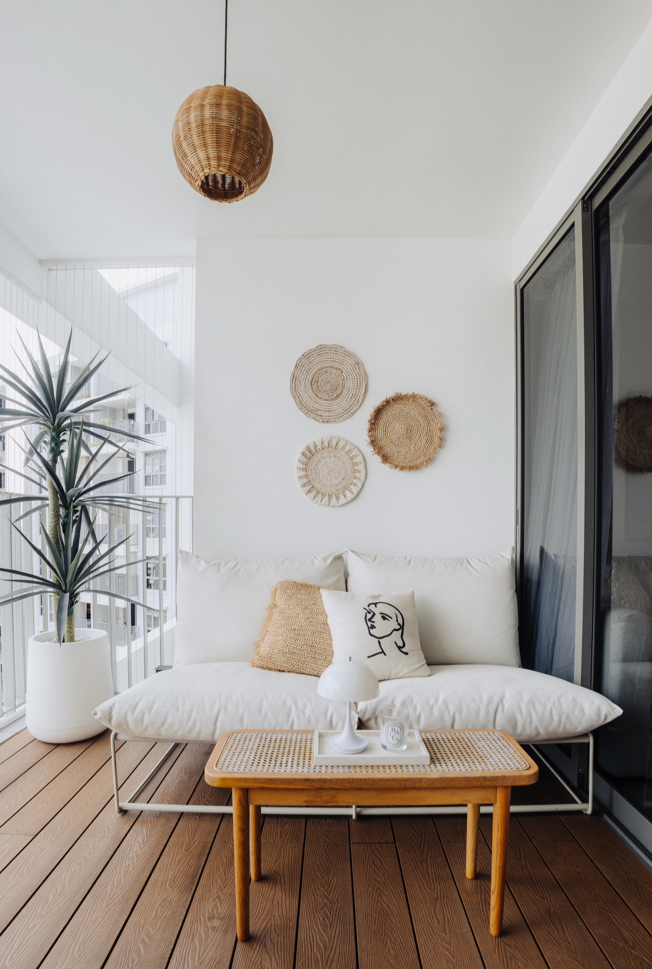 Our 10sqm Balcony: Outdoor Oasis That Makes Our DBSS Look Like A Condo - Modern living room with white walls, wooden floor