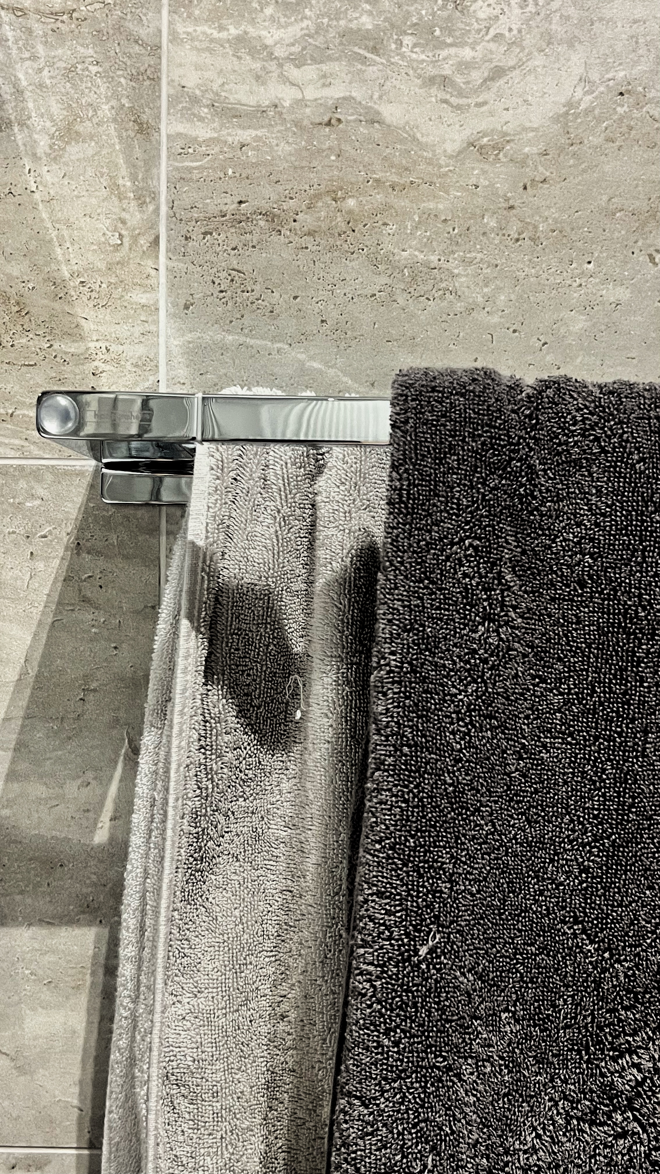 From Routine to Retreat: Crafting a Luxurious Bathroom Experience - towel rack, gray towel, black towel, bathroom vanity