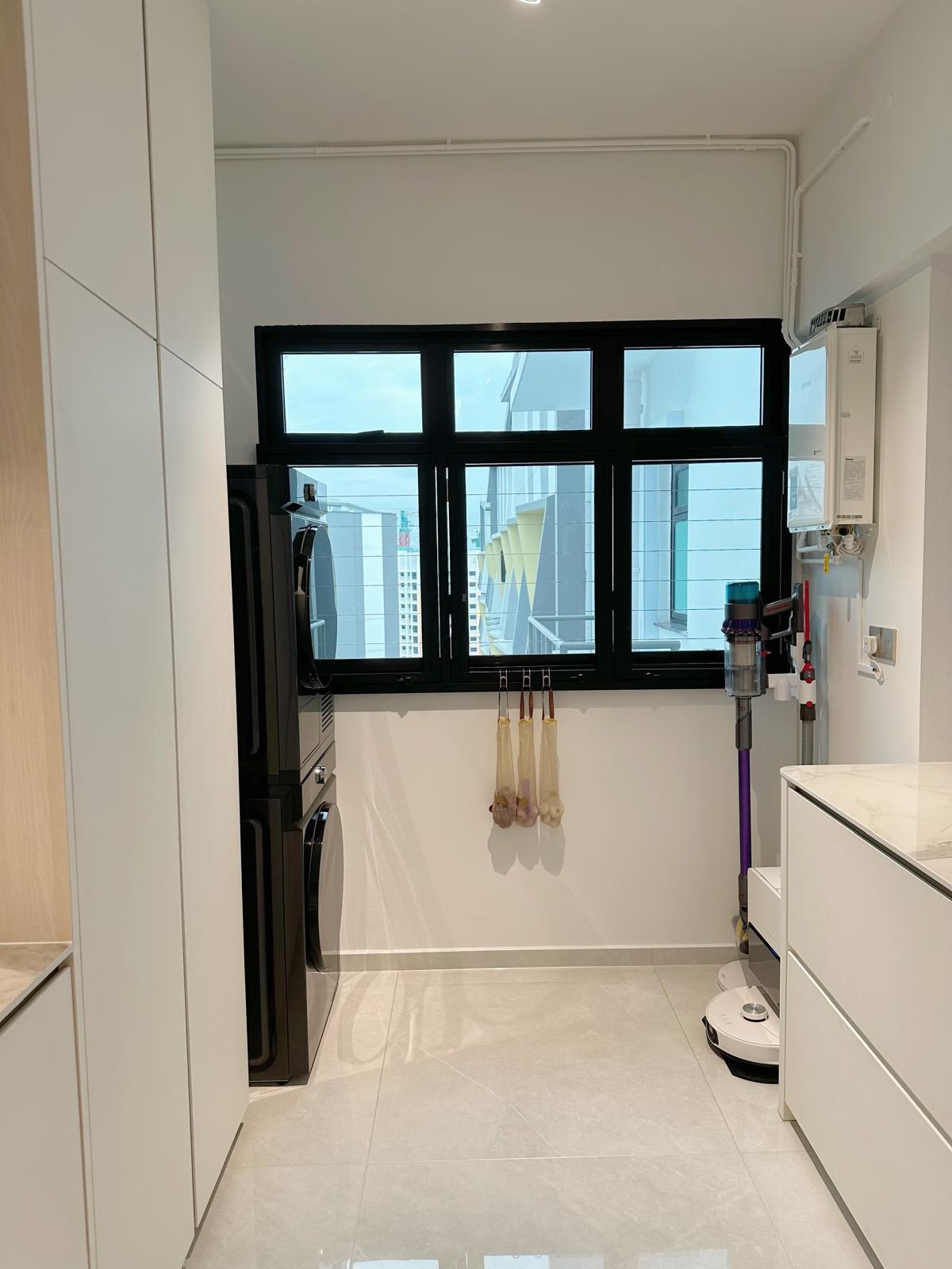 Our service yard: Functional extension of our kitchen - Modern kitchen with sleek appliances, black refrigerator and oven