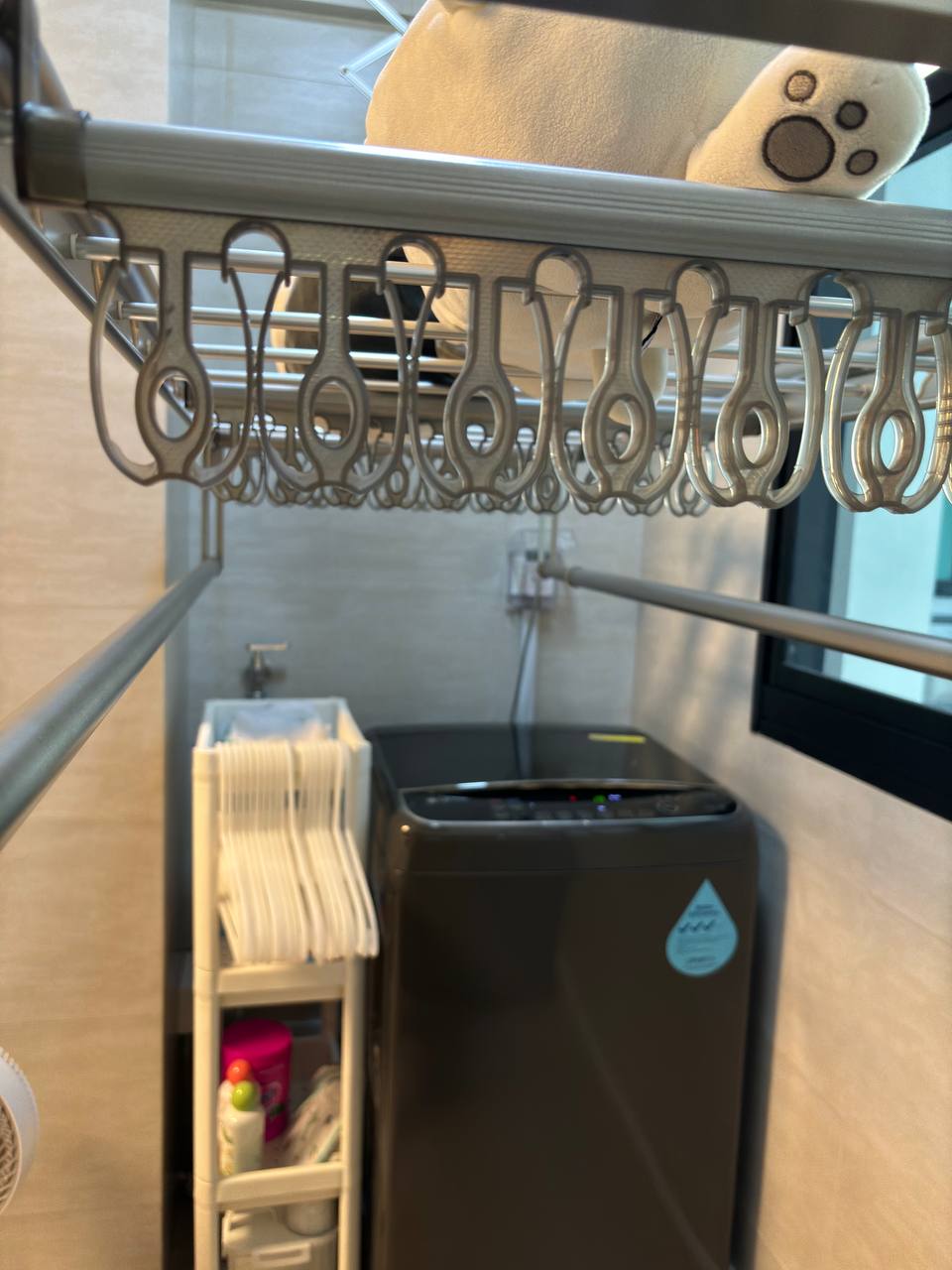 Simple & clutter-free Service Yard with zero built-ins - Drying rack, laundry basket, ironing board, towel rack, hanging