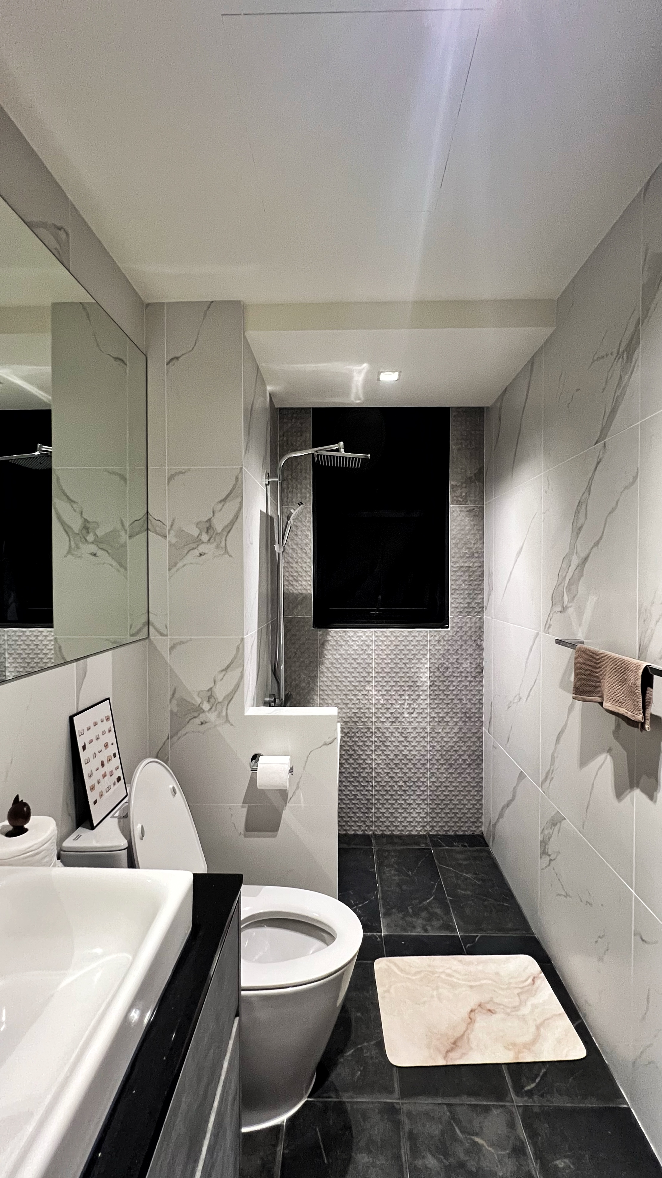 A Royal Retreat: Creating the Perfect Bath Sanctuary for ‘The Queen' - Modern bathroom with sleek design, white and gray