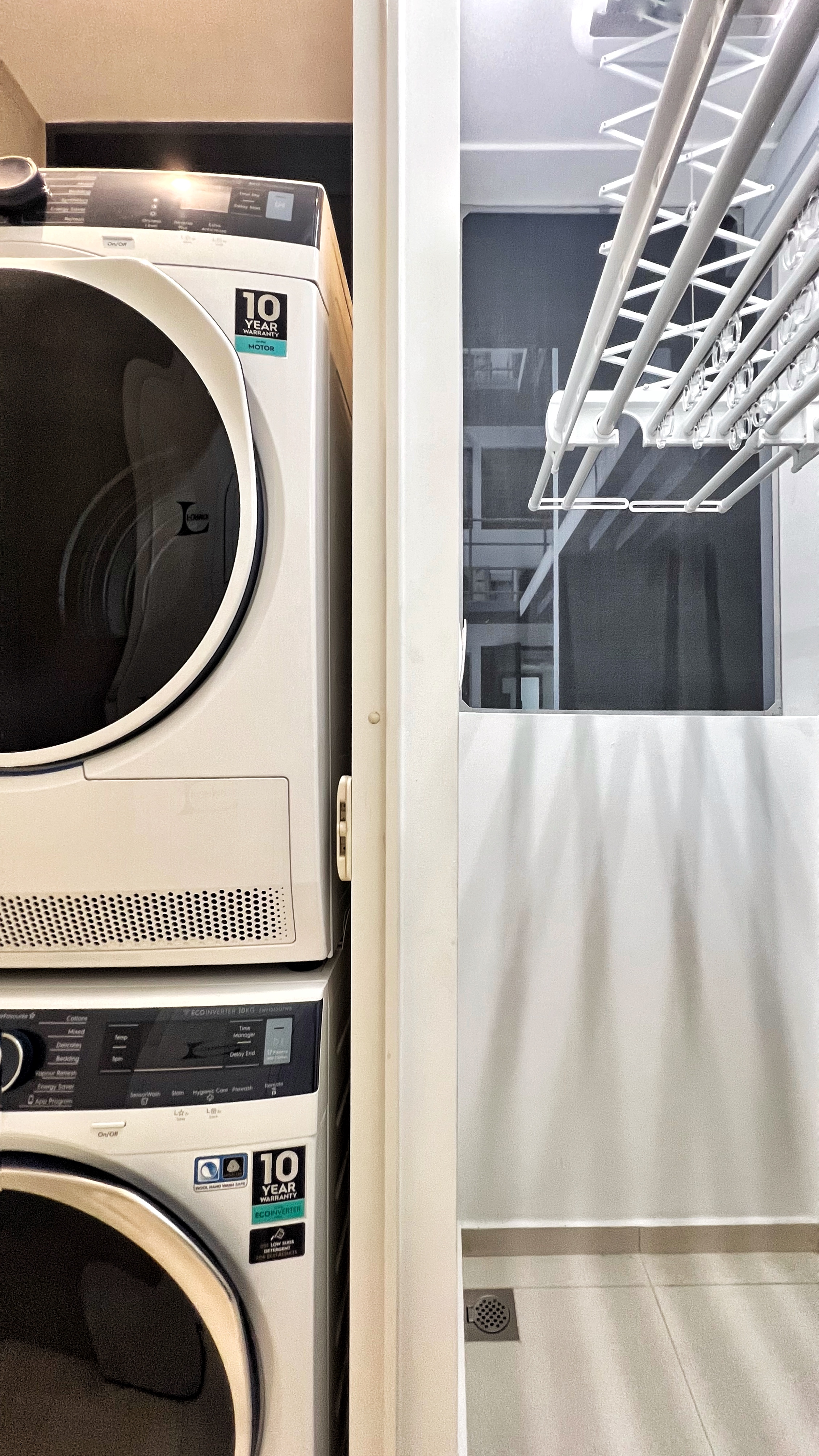 The Unsung Heroes: Where the Magic of Cleanliness Happens - Washing machine, indoor laundry, modern washer, 10-year warranty