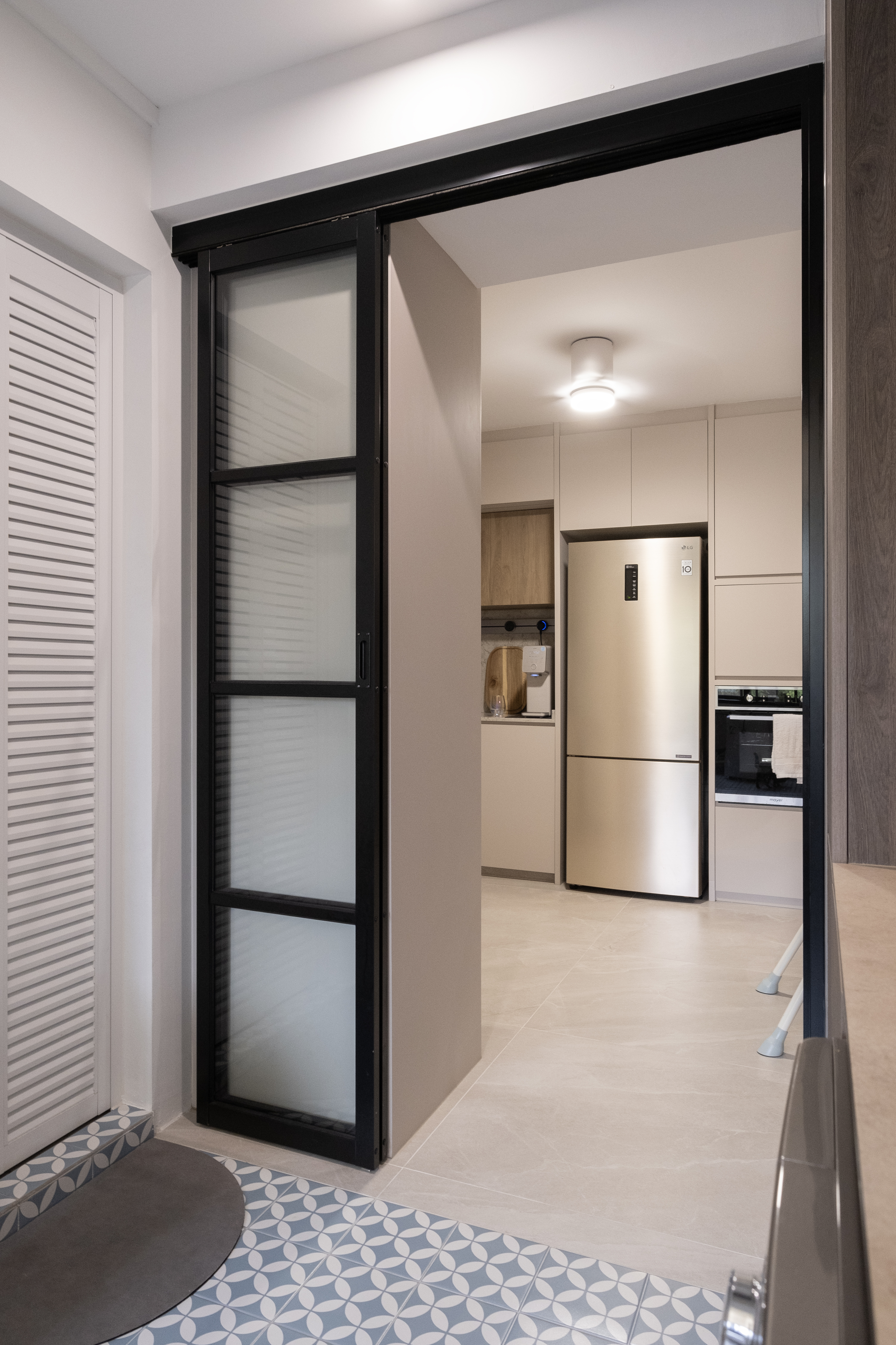 Old & Wet Kitchen No More: Meet our New Bright & Airy Service Yard - Modern kitchen with sleek stainless steel refrigerator