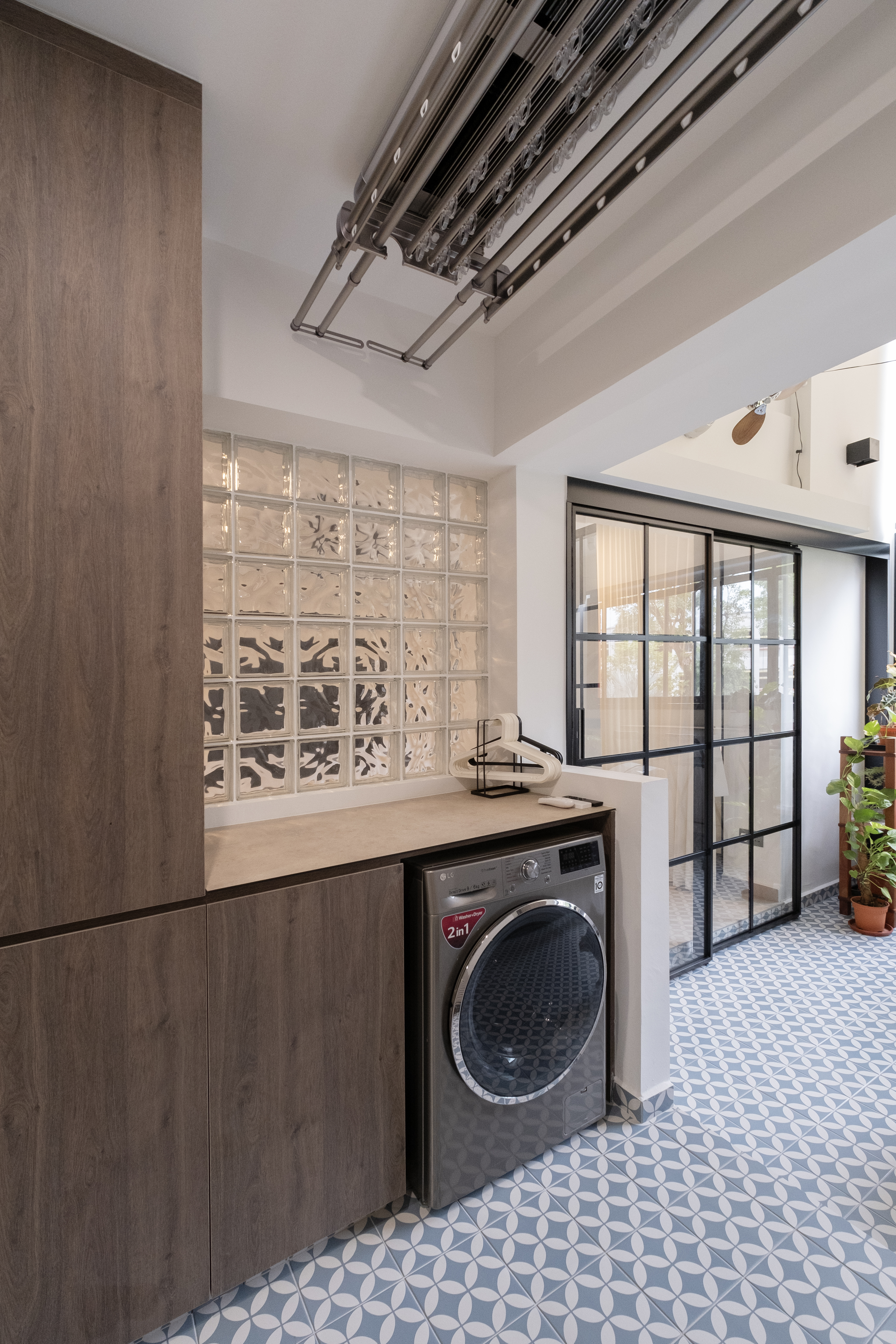 Old & Wet Kitchen No More: Meet our New Bright & Airy Service Yard - Wooden cabinetry, modern design, tiled floor, geometric