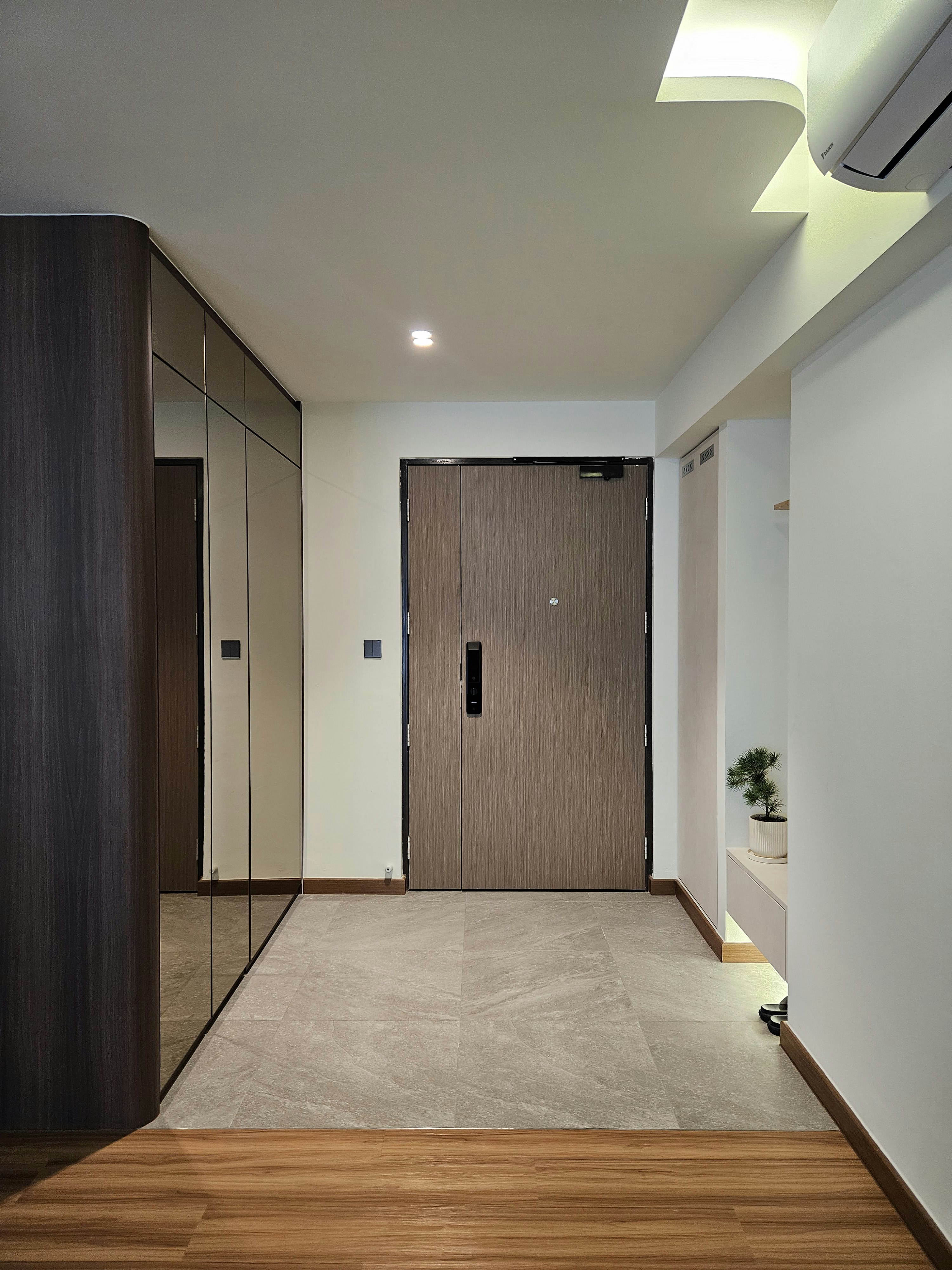 A Neat Home: Home Organisation! - Modern minimalist hallway, sleek wooden doors, mirrored wardrobe, soft ambient lighting