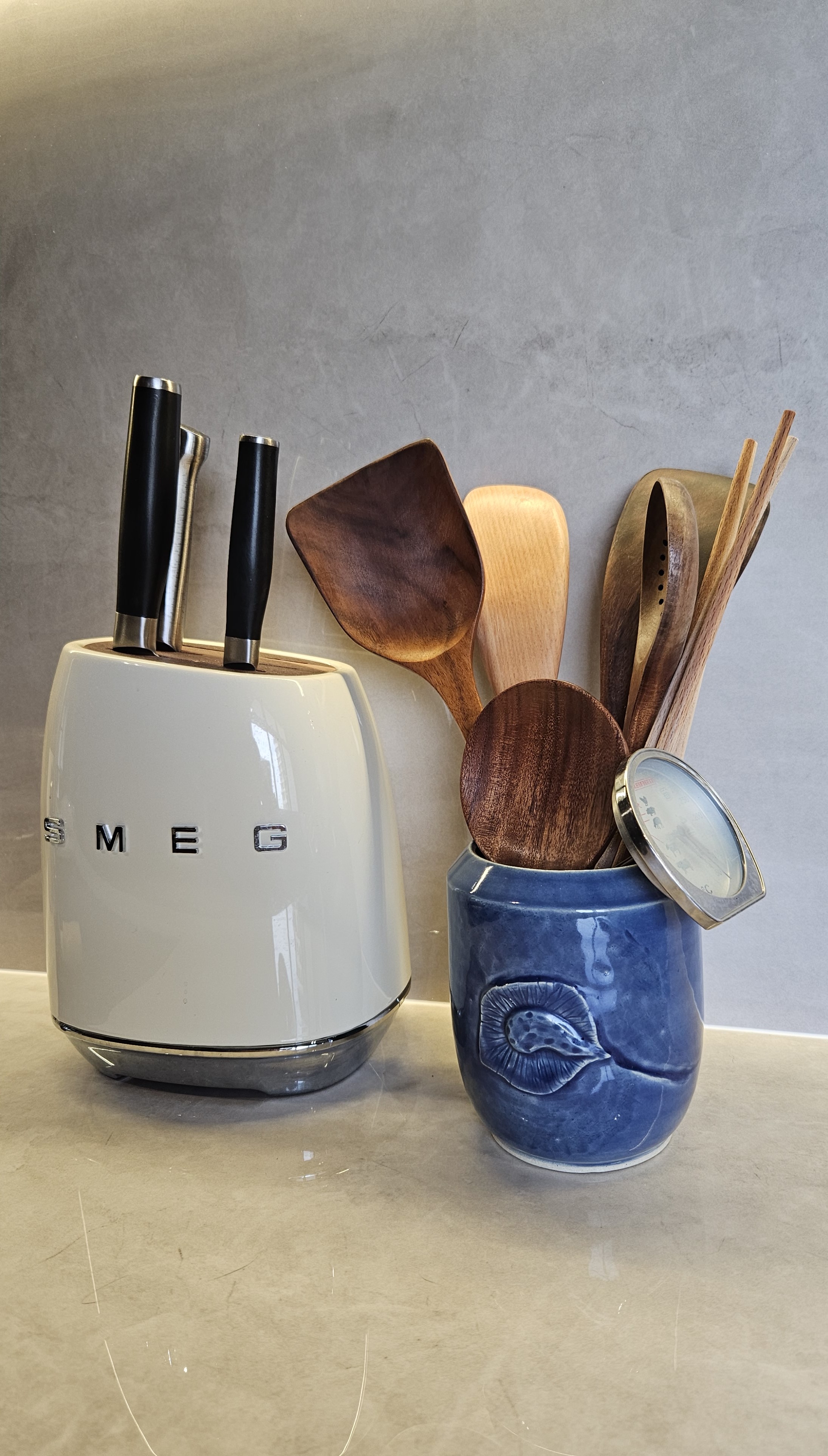 A Neat Home: Home Organisation! - White SMEG toaster, wooden kitchen utensils, blue ceramic container, wooden spoons
