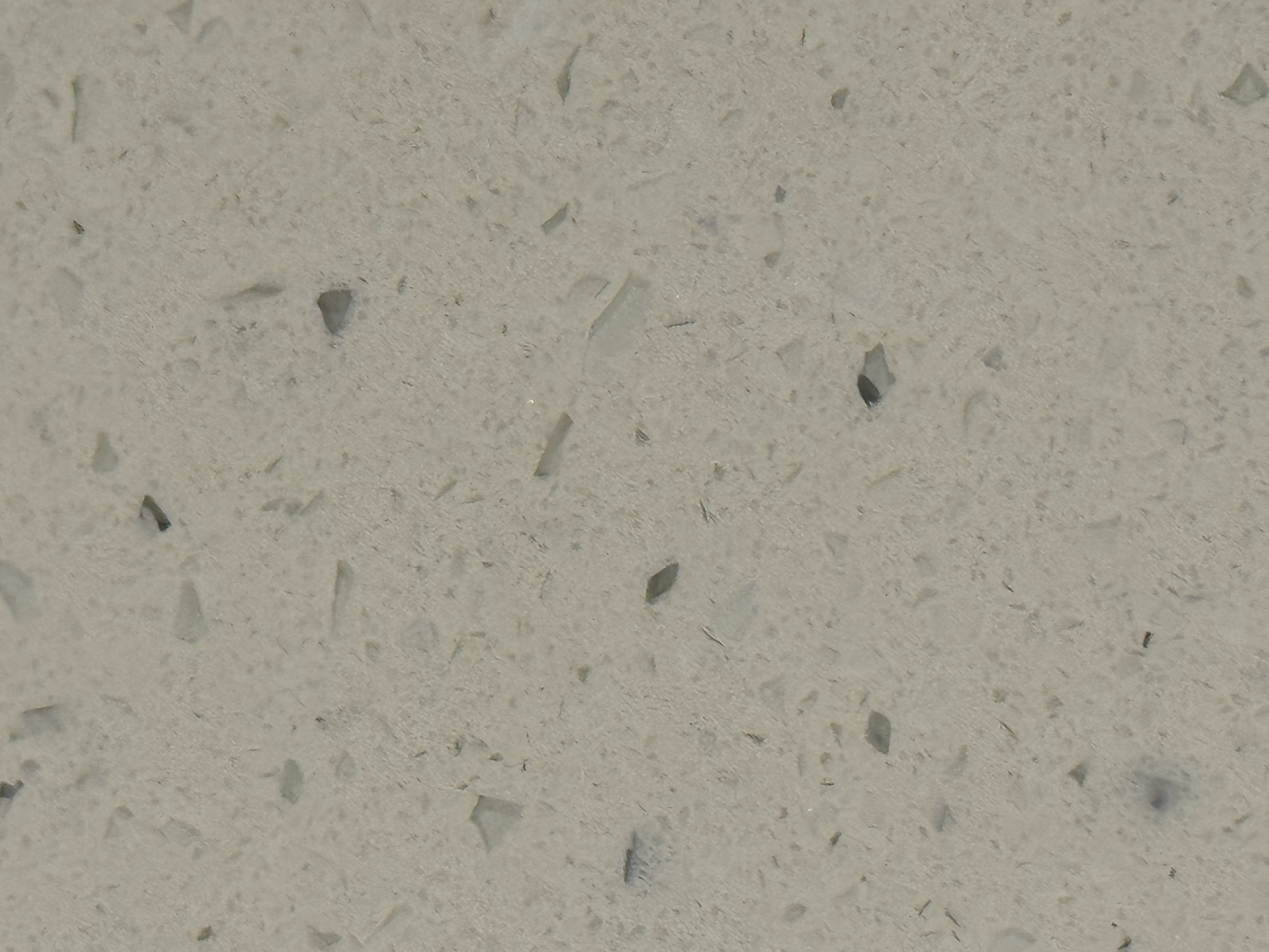 Beneath the Surfaces: Upkeep & Maintenance - Sand, gravel, small pebbles, coarse texture, light beige color, natural ground