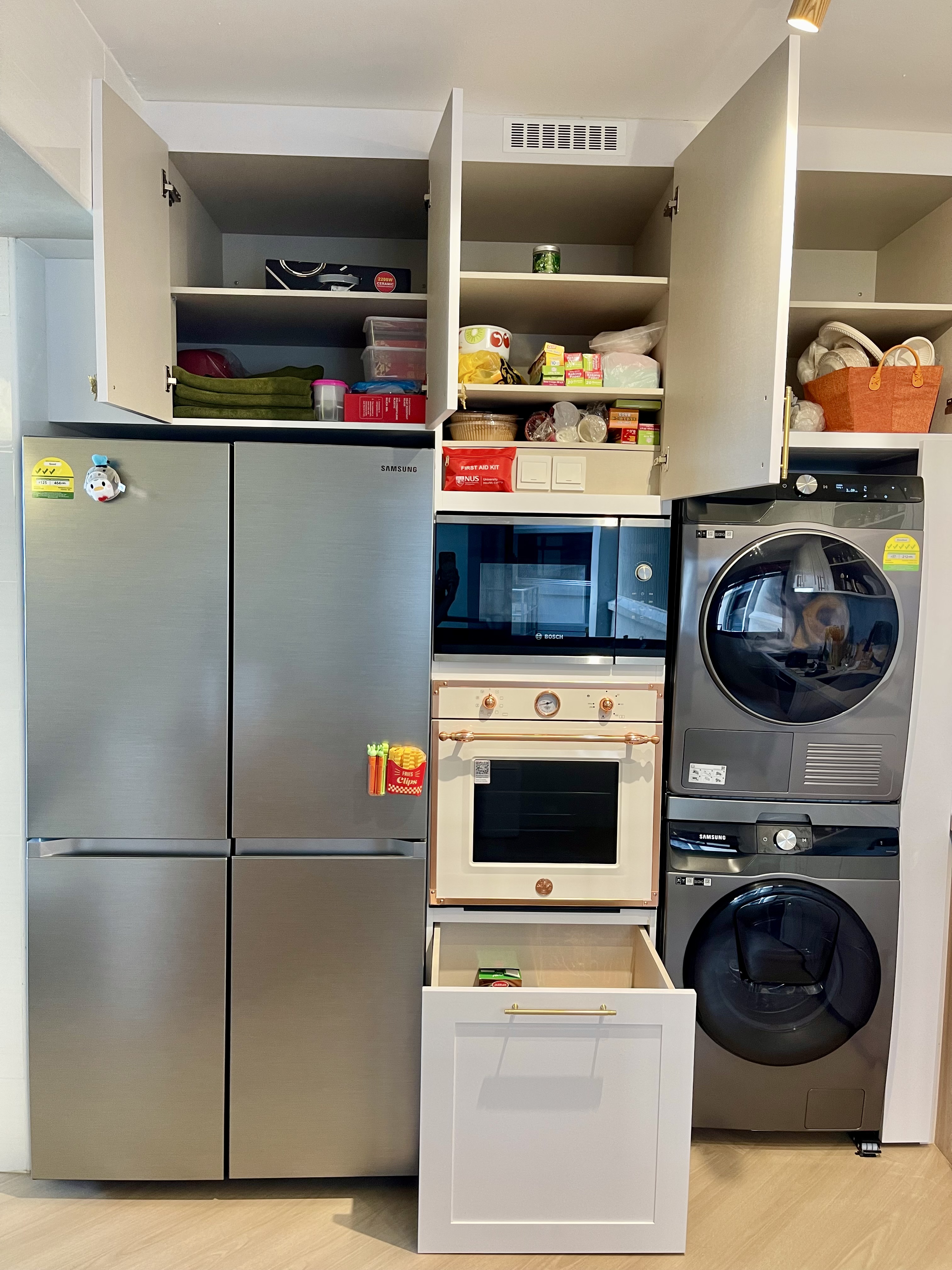 Keeping Our Open Concept Kitchen Clutter Free With Storage Solutions - Stainless steel refrigerator, open cabinets, organized