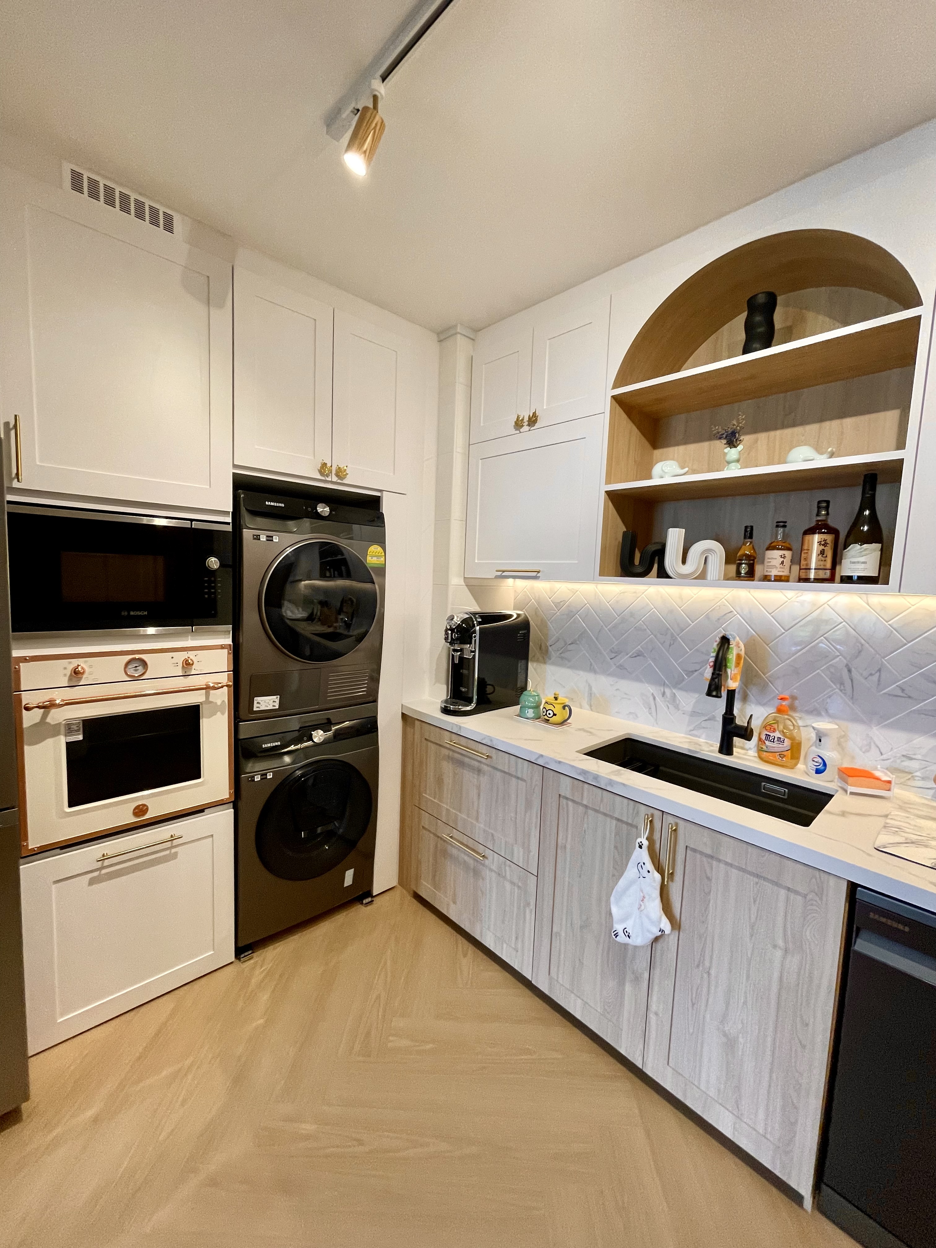 Keeping Our Open Concept Kitchen Clutter Free With Storage Solutions - White kitchen cabinets, stainless steel appliances