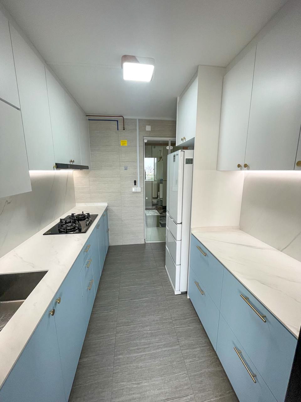 A peep into our kitchen cabinets!  - Modern kitchen with sleek white cabinets and light blue drawers, stainless steel