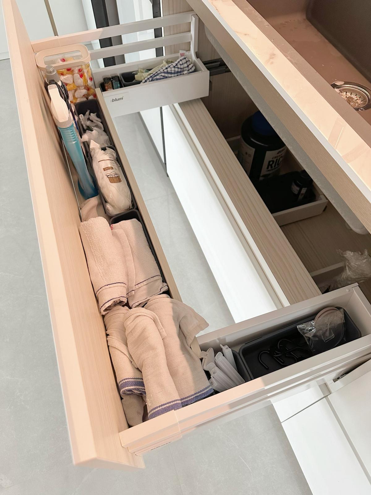 Kitchen Organisation: Tidy & practical - Wooden medicine cabinet, neatly organized, dual drawers, towels, toiletries