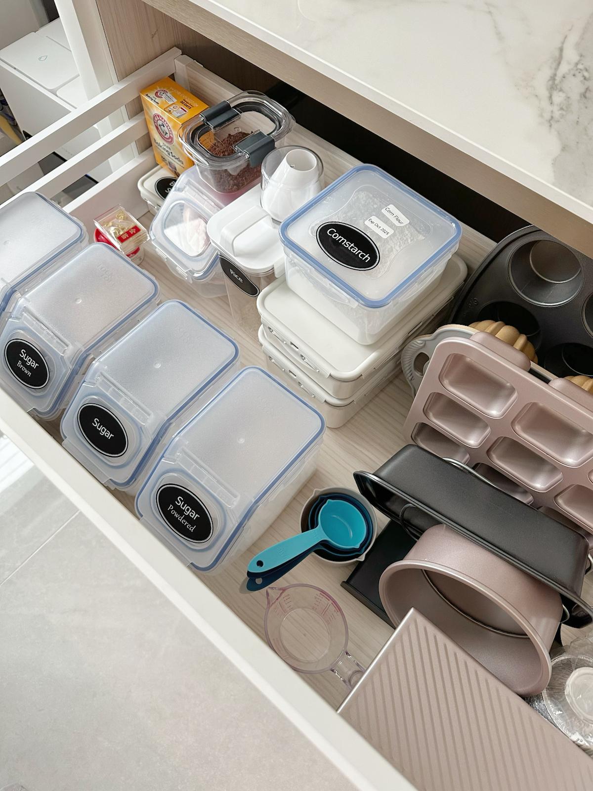 Kitchen Organisation: Tidy & practical - Clear plastic containers, labeled "Sugar Brown, " "Cornstarch, " and "Sugar