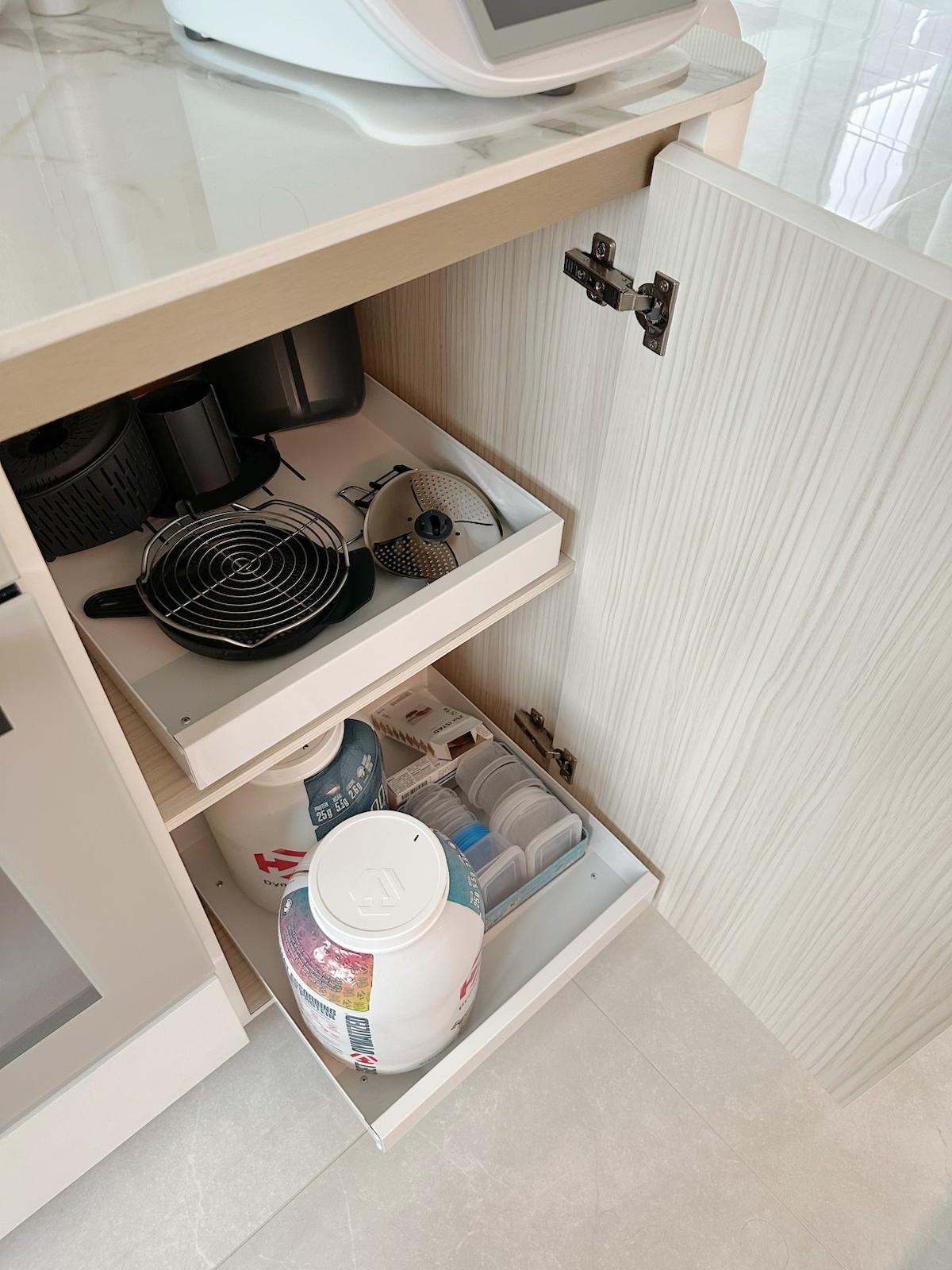 Kitchen Organisation: Tidy & practical - White kitchen cabinet, open drawer, neatly organized, cooking utensils, microwave