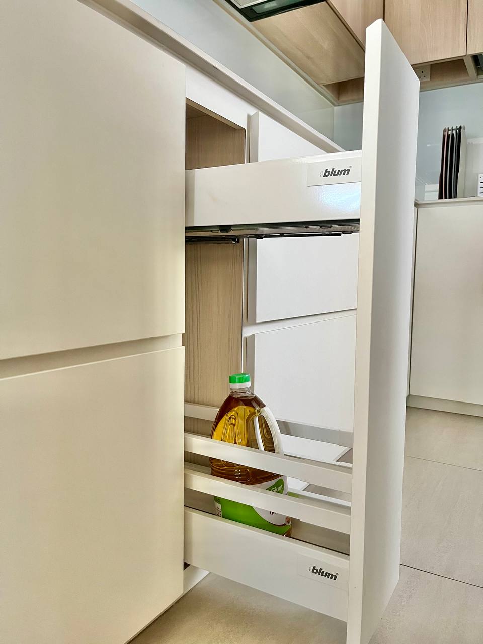 Kitchen Organisation and Reno Regret - White refrigerator with open door, oil bottle inside, refrigerator shelves, modern