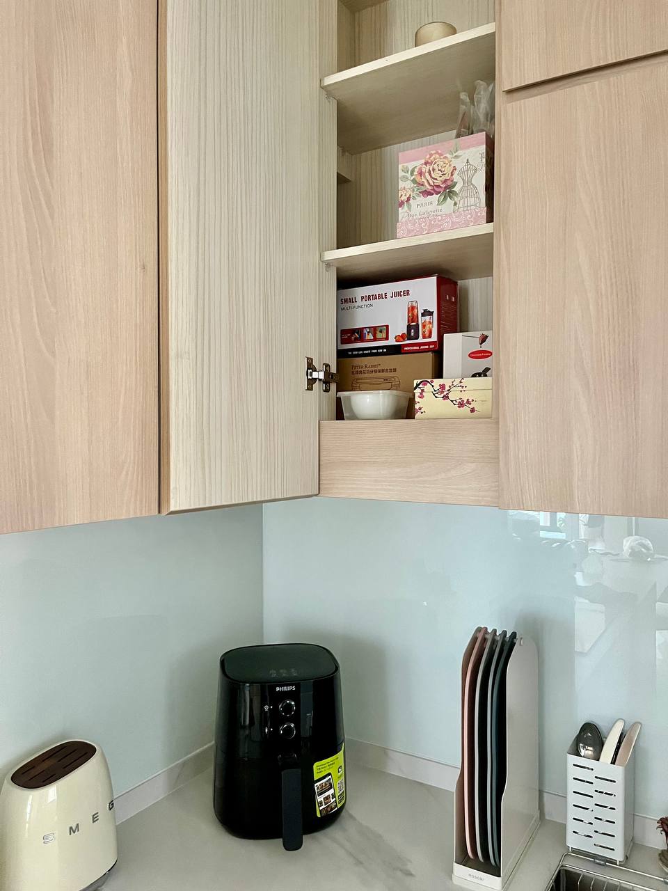 Kitchen Organisation and Reno Regret - Wooden kitchen cabinets, open pantry, small portable juicer, pink floral box, white