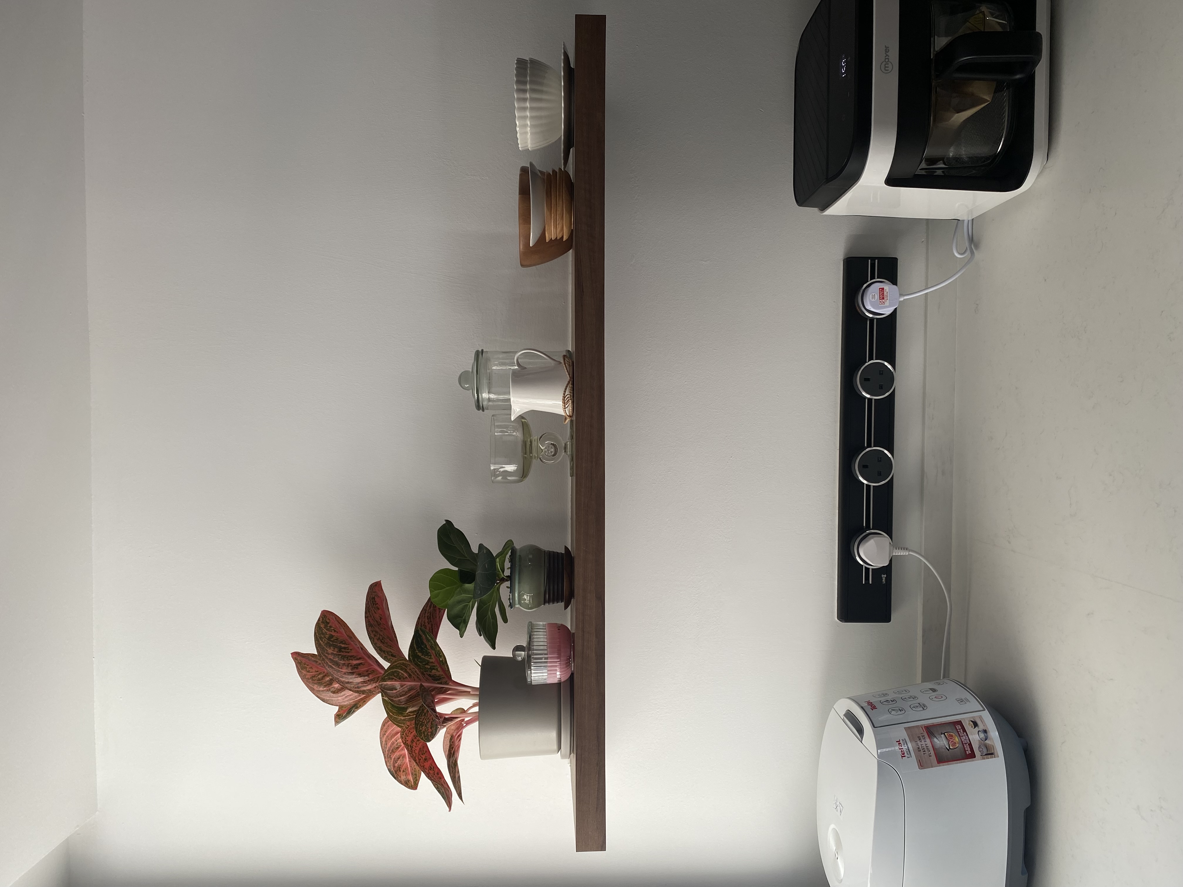 Stuff we keep in our small kitchen and how we did it ✨ - White minimalist kitchen, modern appliances, wooden shelf, green