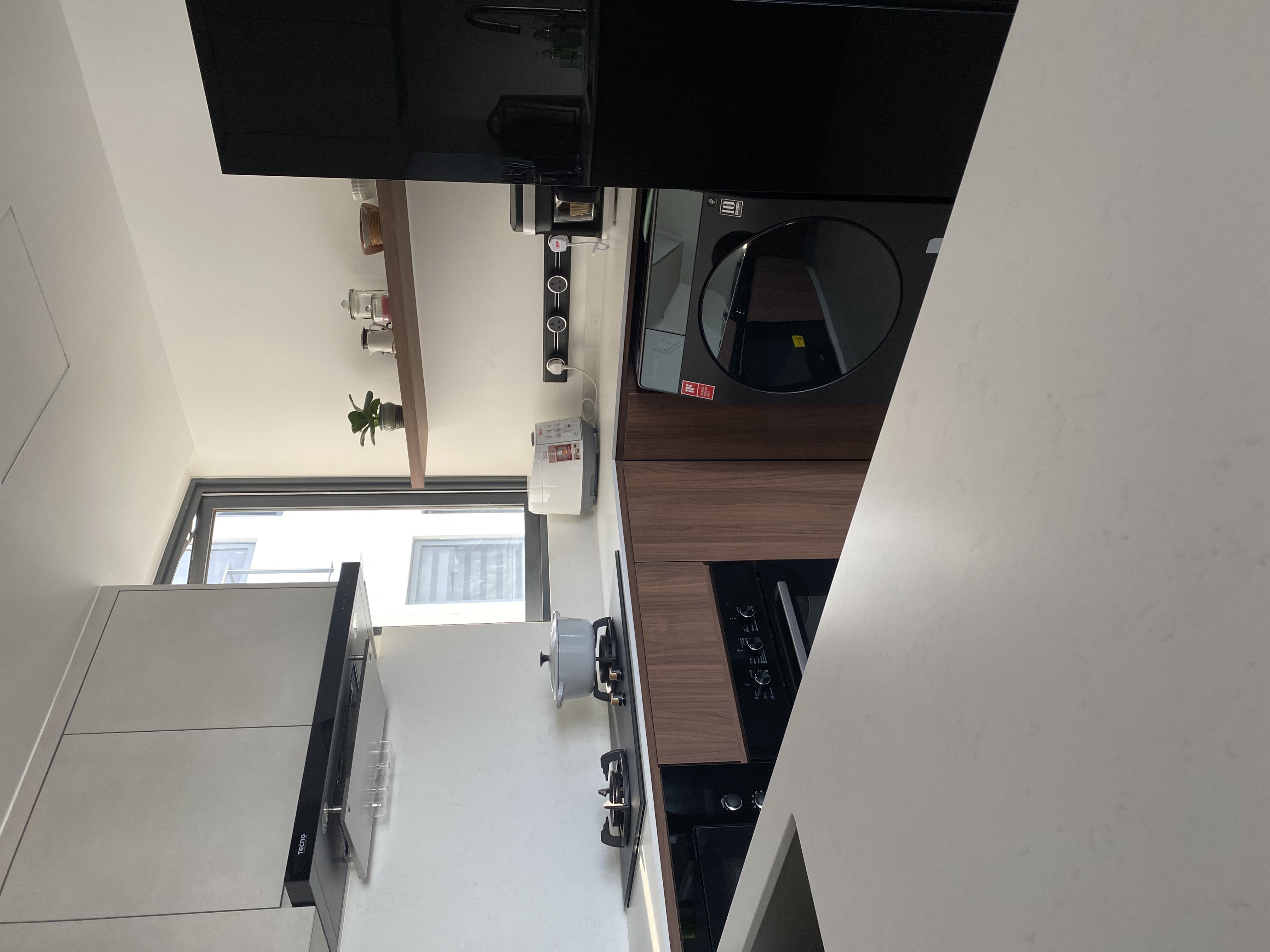 Stuff we keep in our small kitchen and how we did it ✨ - Modern kitchen with sleek appliances, minimalist design, open