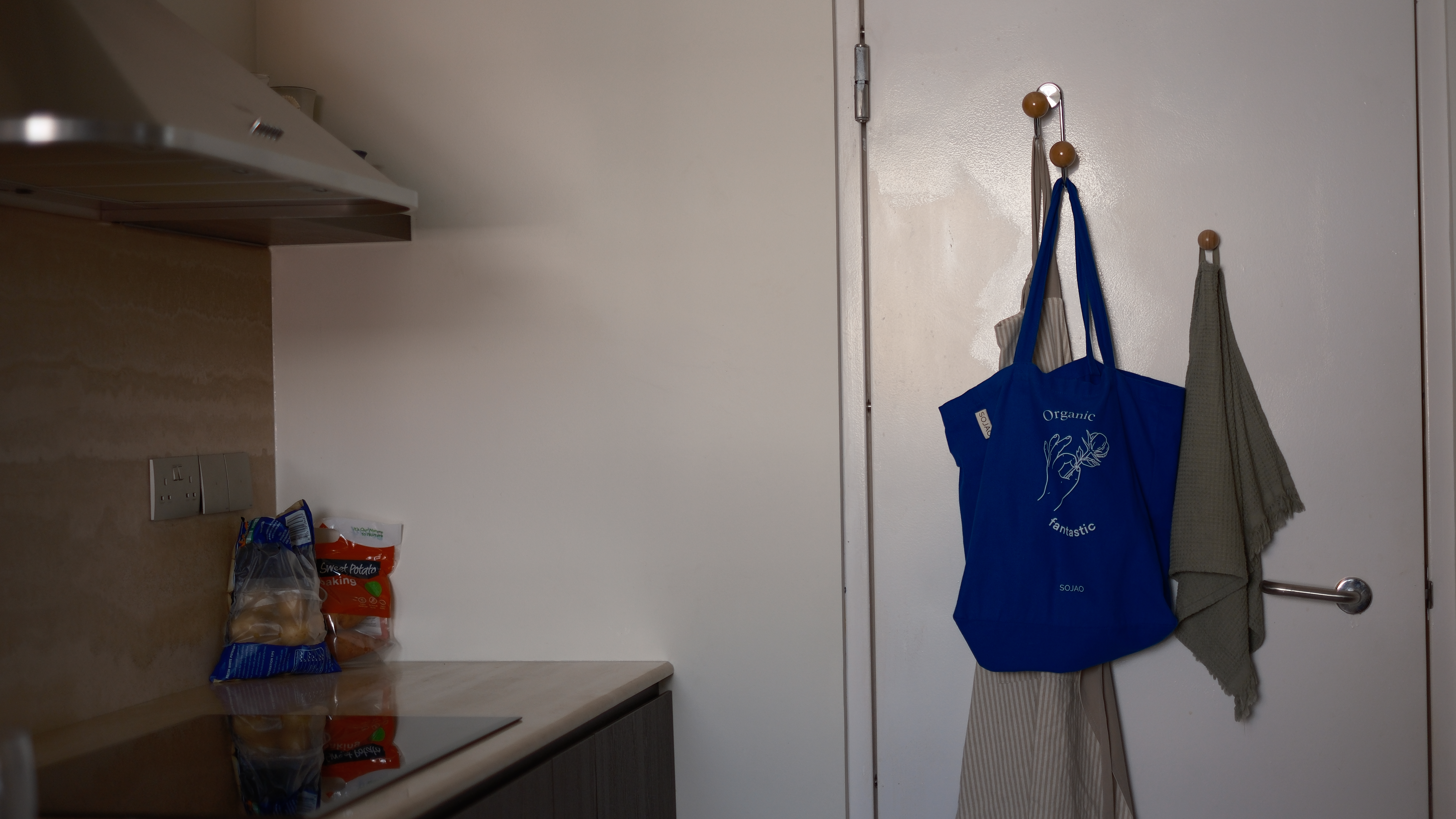 Keeping our Open Kitchen Clutter-free: Out of Sight, Out of Mind - Organic, bag, kitchen, countertop, blue shirt, hanging