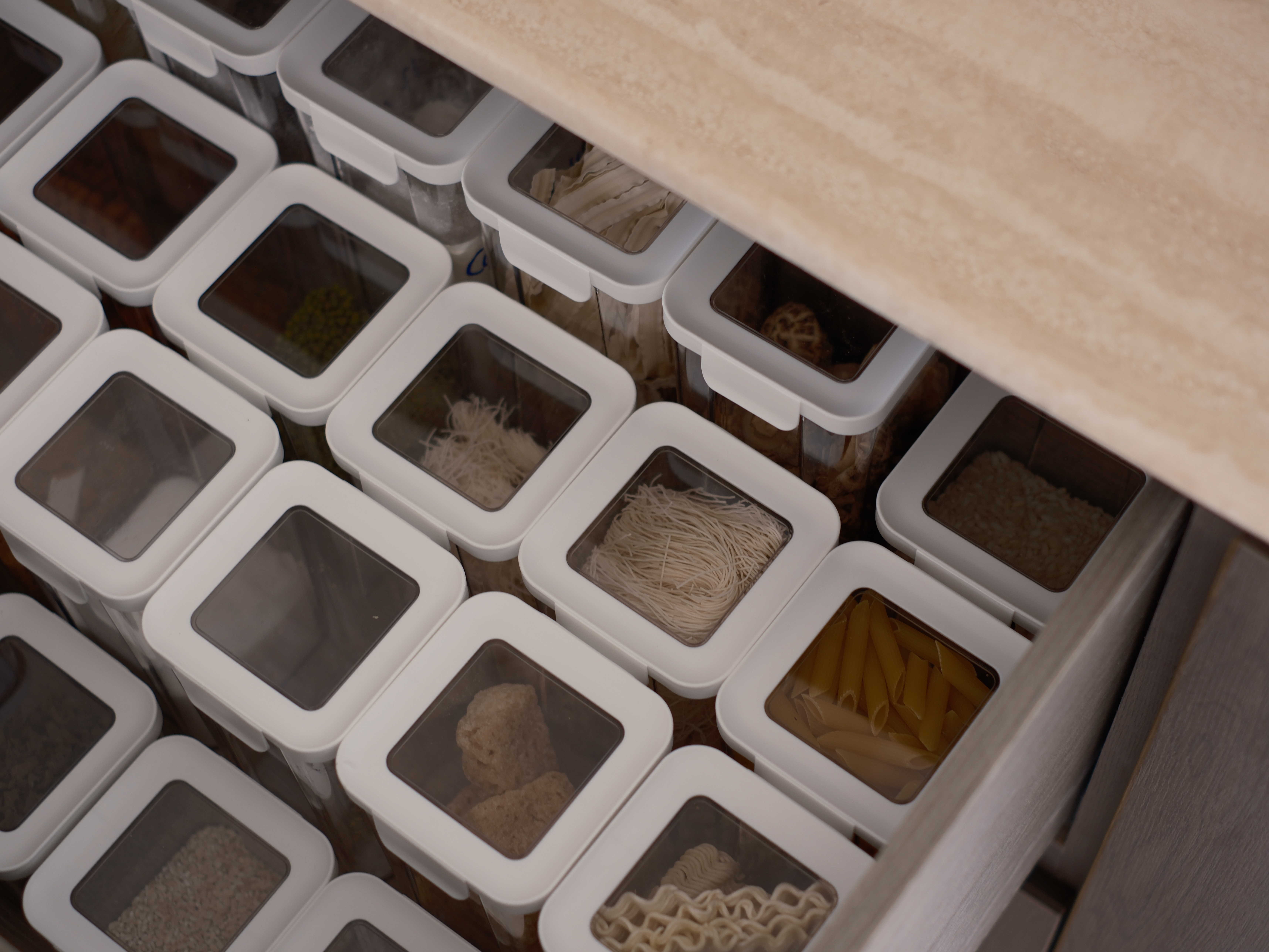 Keeping our Open Kitchen Clutter-free: Out of Sight, Out of Mind - White storage bins, transparent lids, neatly organized