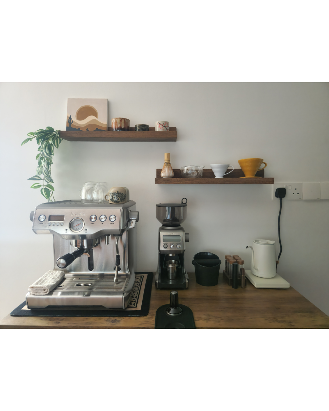 Home Vibes FAQ: Why We Sit on the Floor & Hide Our Clothes - coffee shop, modern kitchen, espresso machine, coffee beans